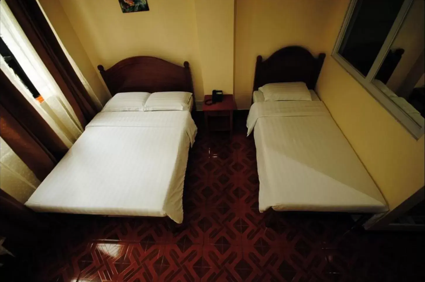 Matrimonial Bed and Single Bed in Hotel 45 Matrimonial Bed and Single Bed in Hotel 45