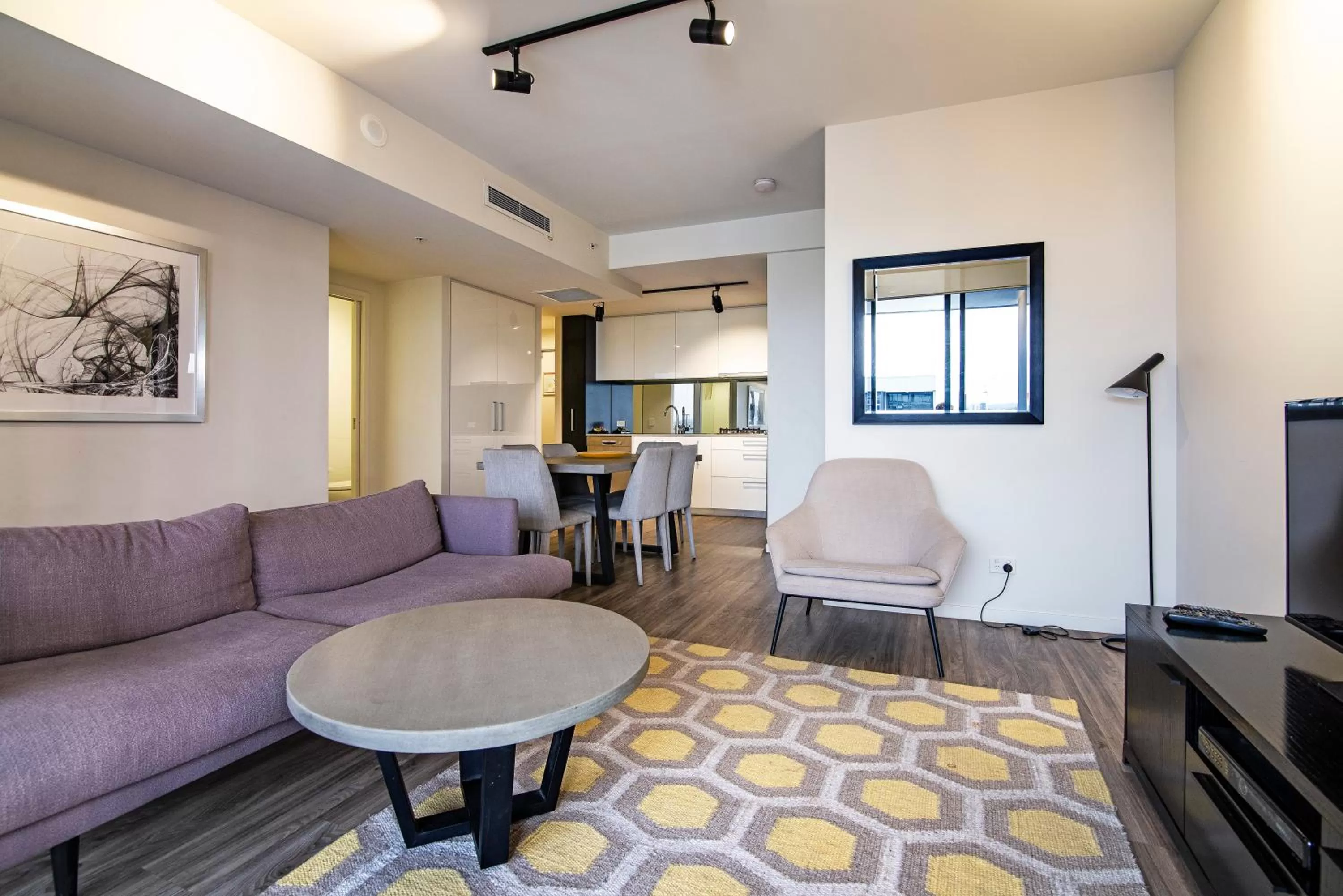 Living room in Arena Apartments by CLLIX