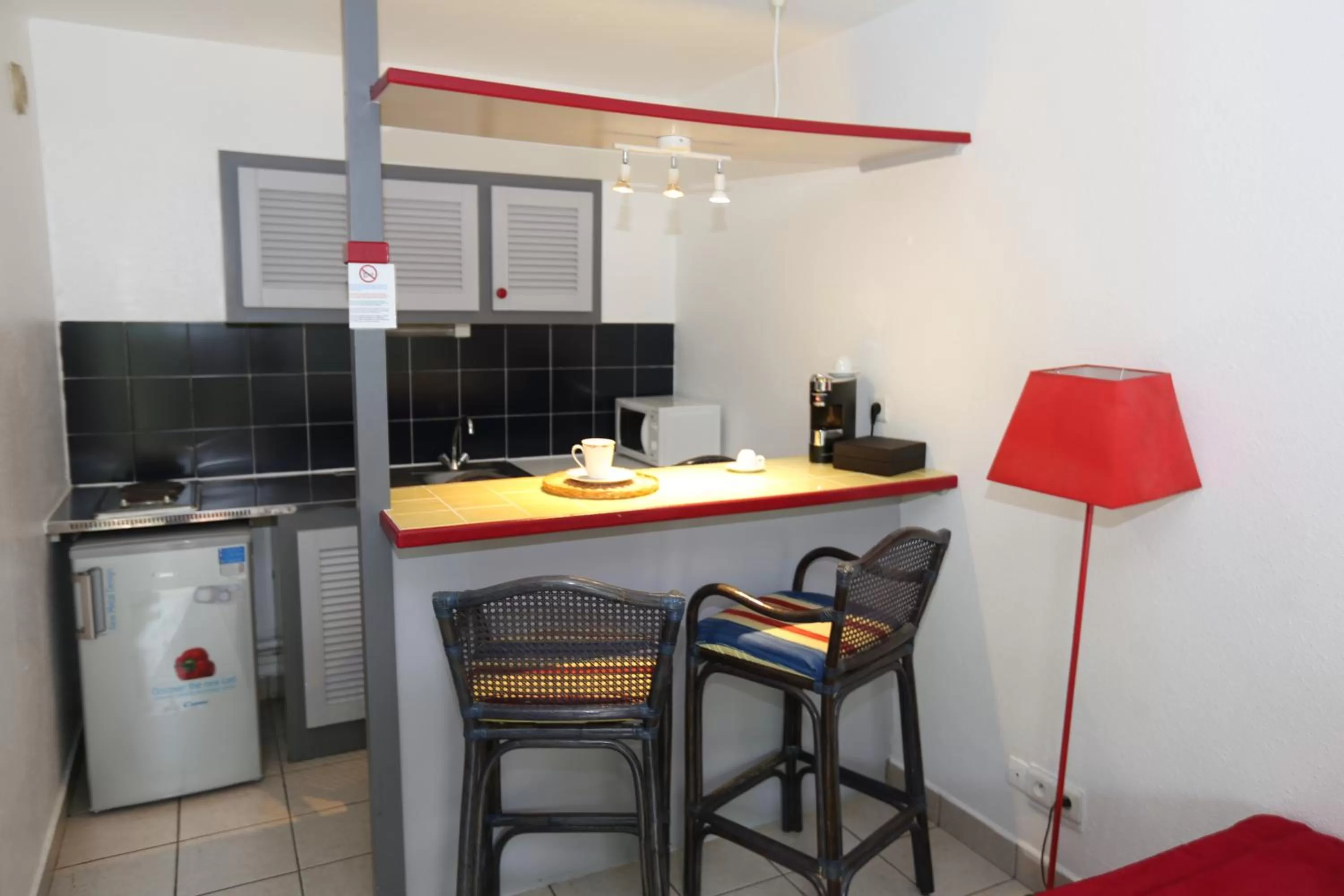 Kitchen or kitchenette in Hotel La Maison Creole