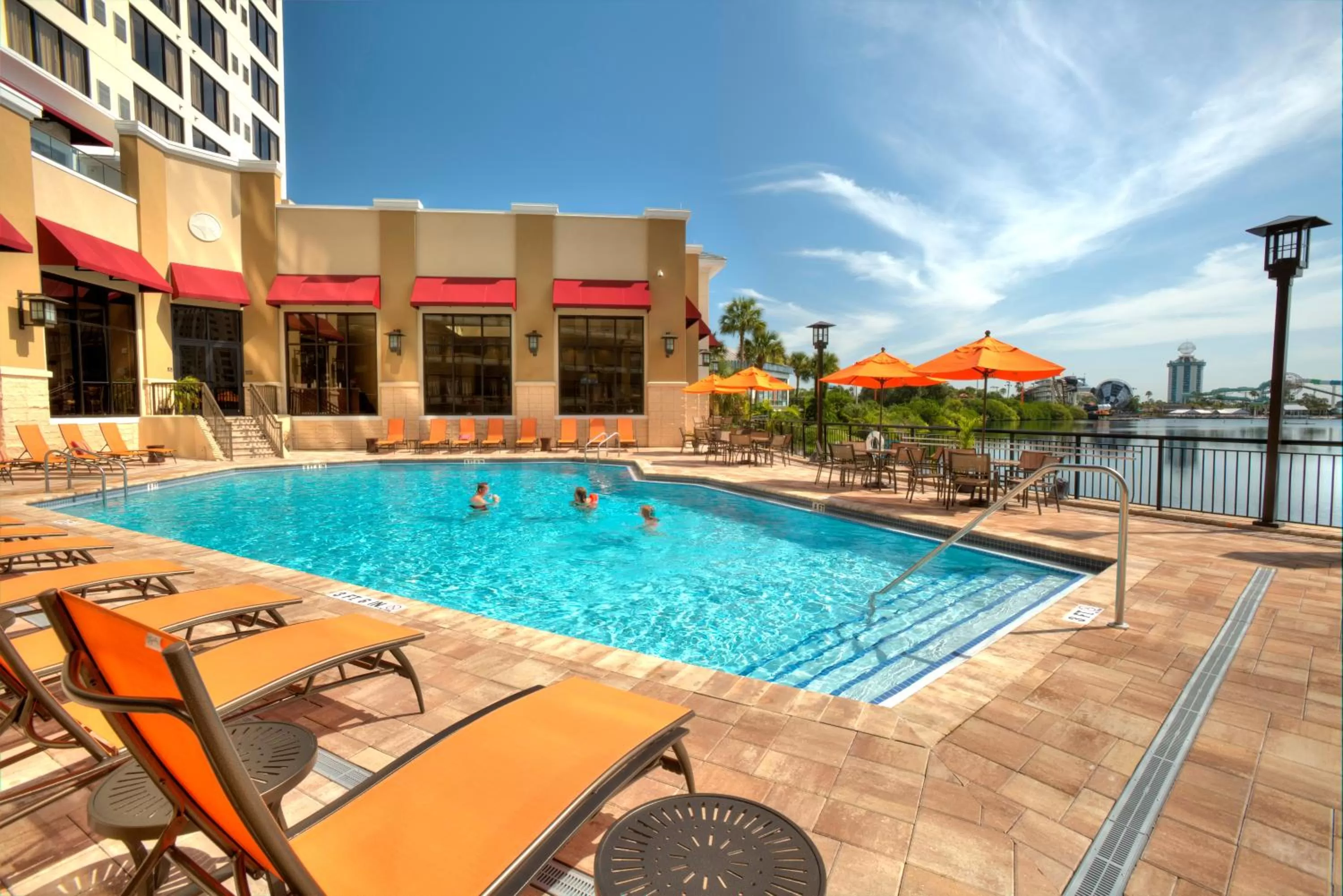 Pool view in Ramada Plaza by Wyndham Orlando Resort & Suites Intl Drive - Newly Renovated!