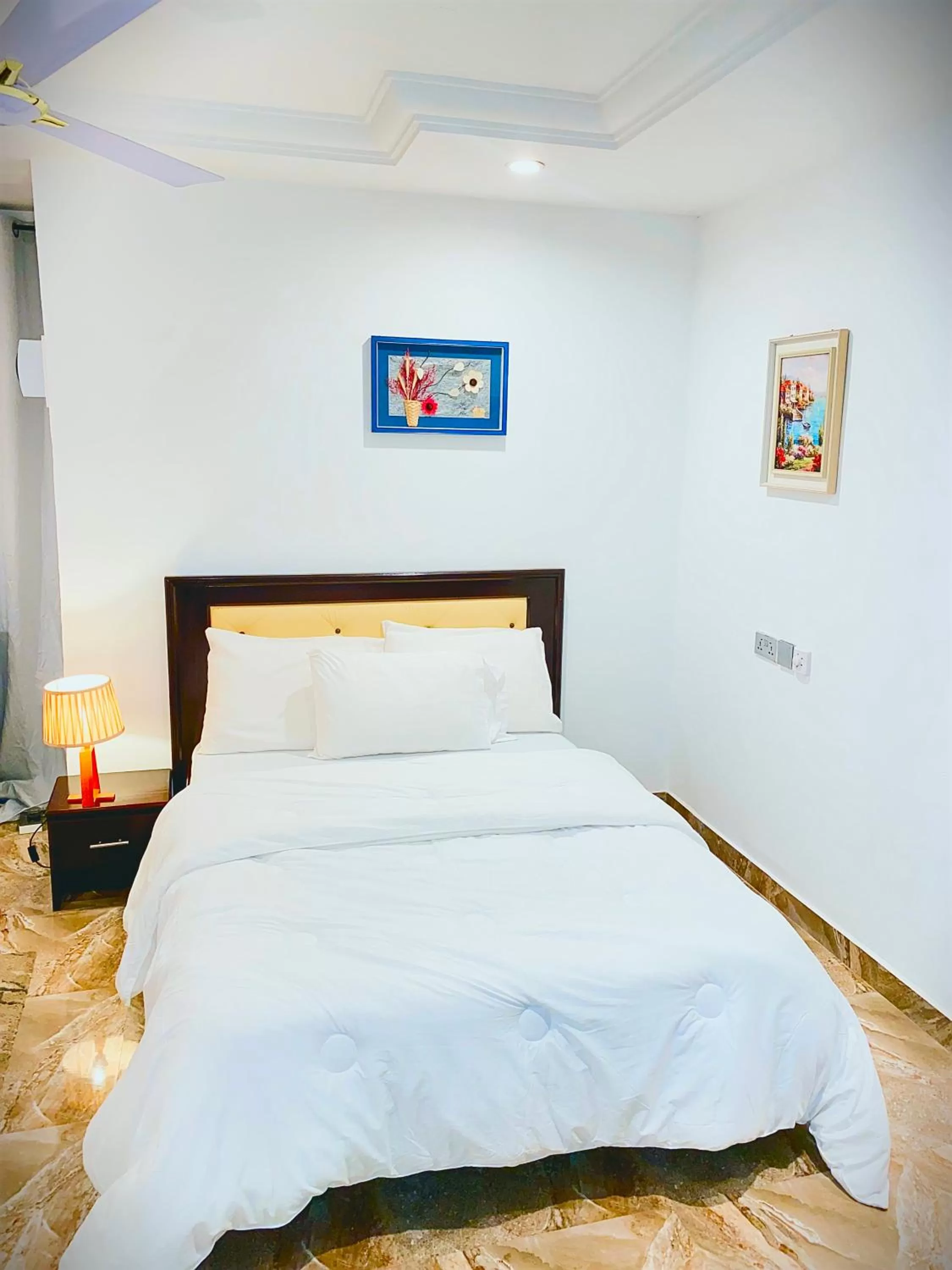 Bed in AIDEN HOMES AND APARTMENTS