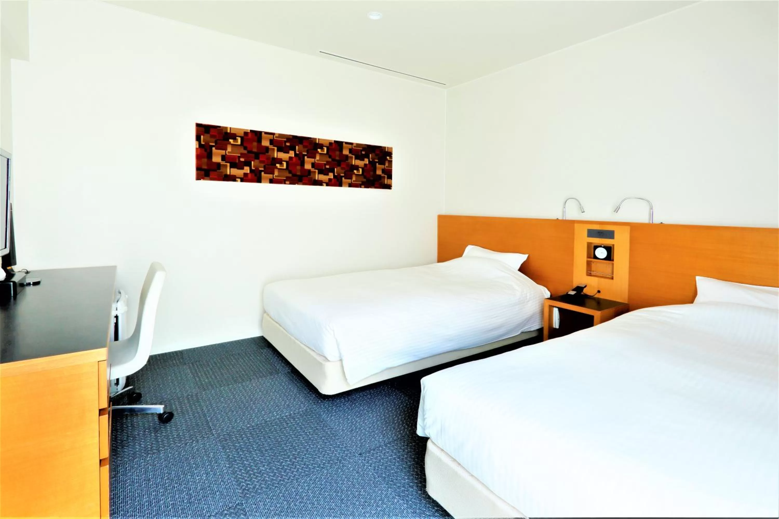 Photo of the whole room, Bed in JR Inn Sapporo