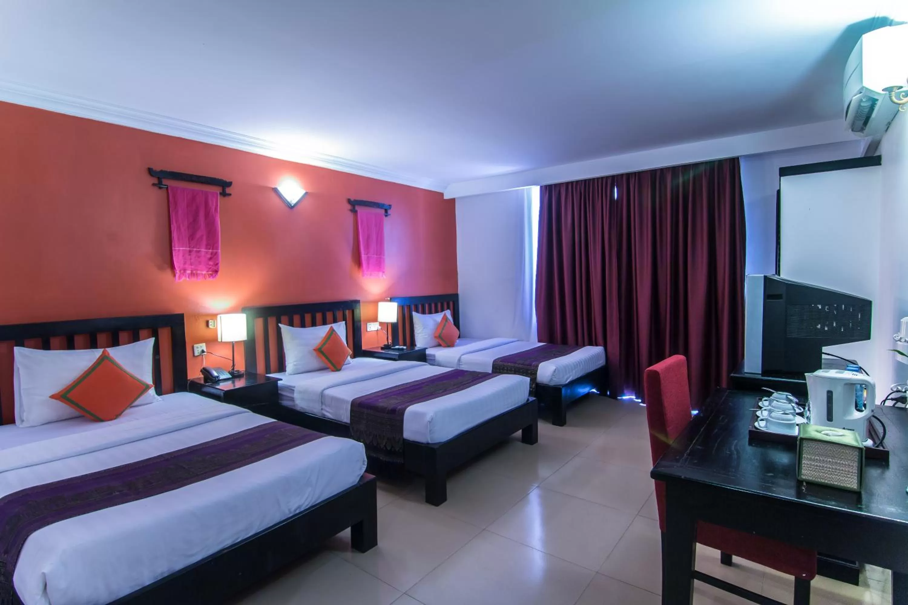 Superior Triple Room with Balcony in Mekong Angkor Palace Inn