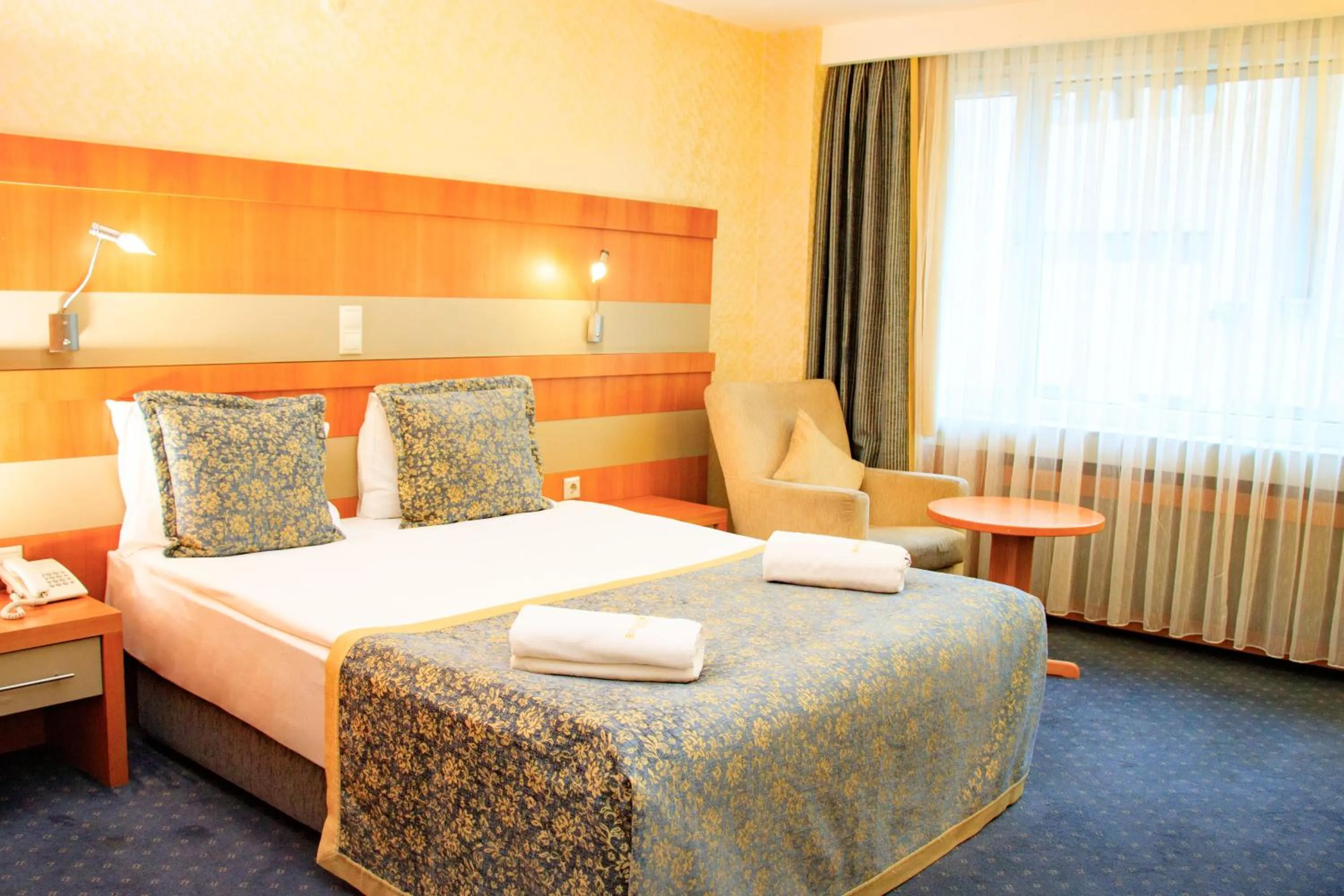 Bed in Burcman Hotel