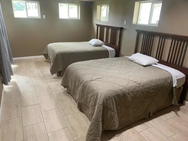 Bed in Mountain Trail Lodge and Vacation Rentals