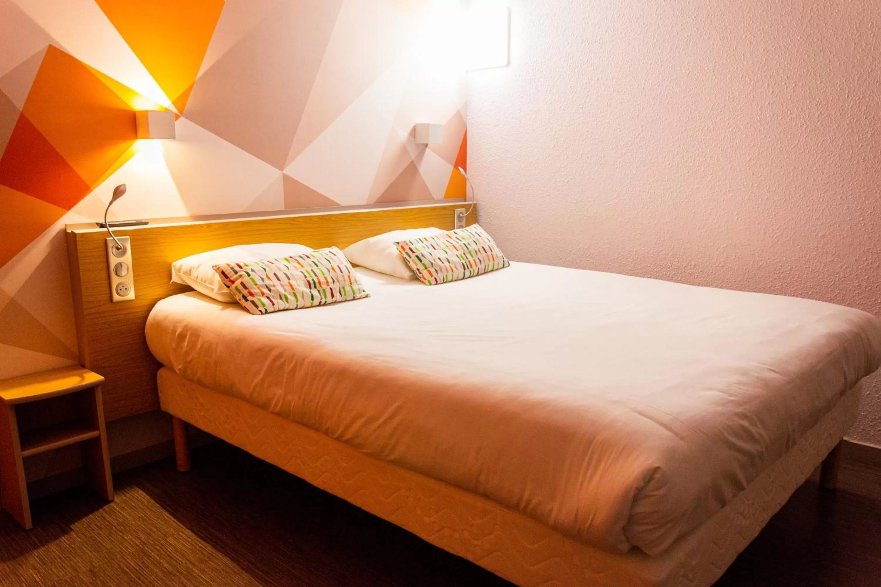 Bed in initial by balladins La Roche-sur-Yon