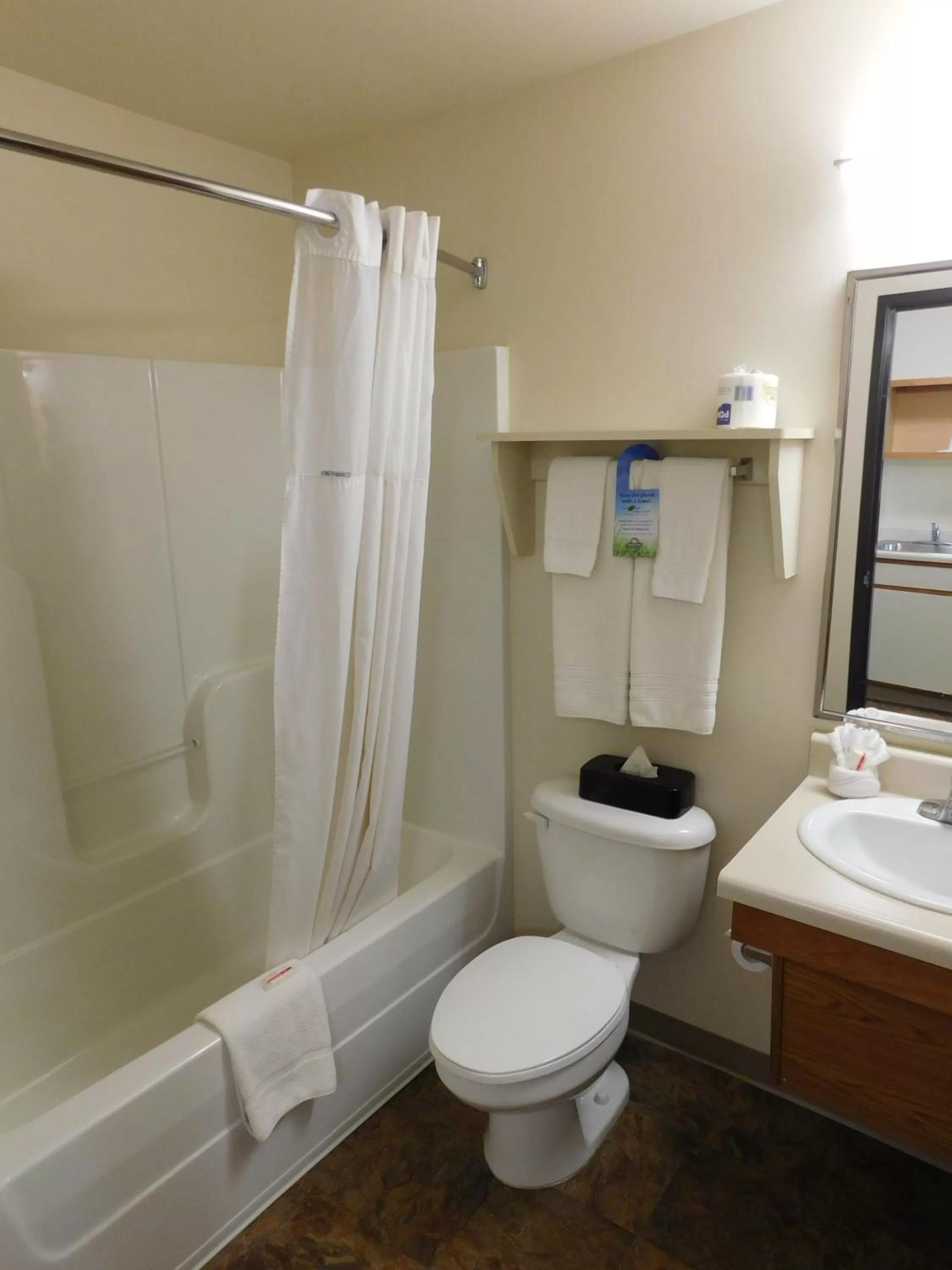 Bathroom in Days Inn & Suites by Wyndham Rochester South