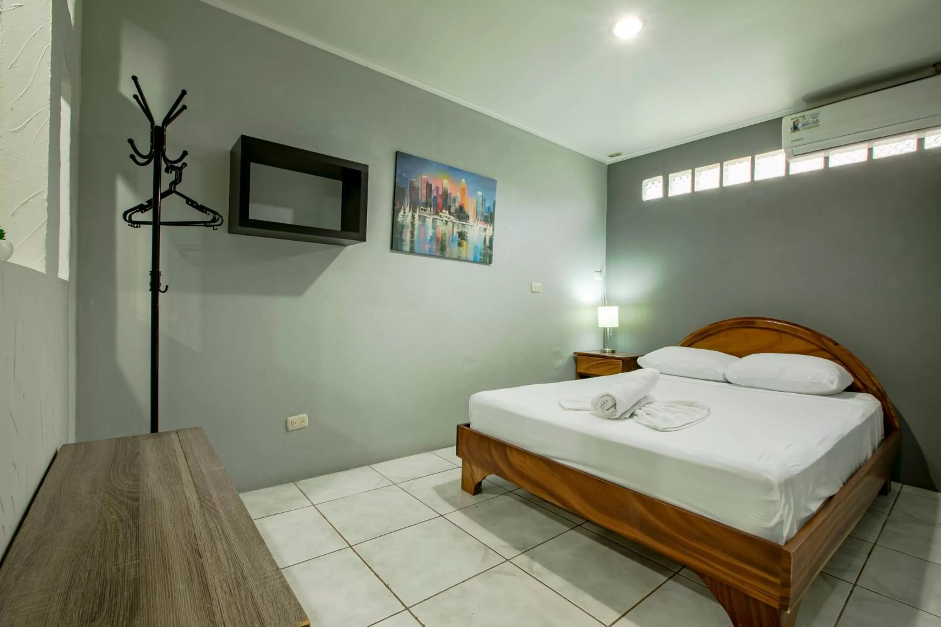 Toilet, Bed in Coati Arenal Lodge