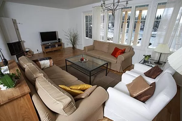 Communal lounge/ TV room, Seating Area in Varjola Holiday Center