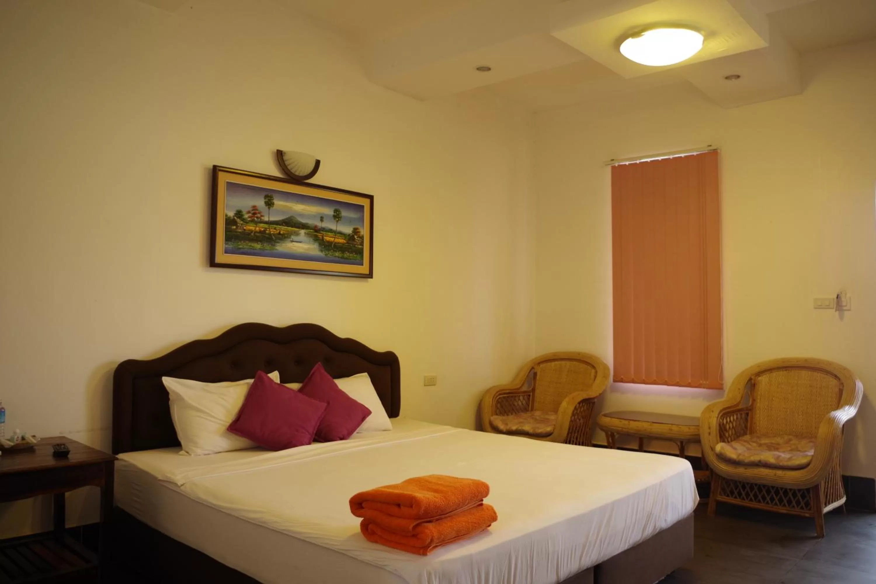 Bed in Apex Koh Kong Hotel