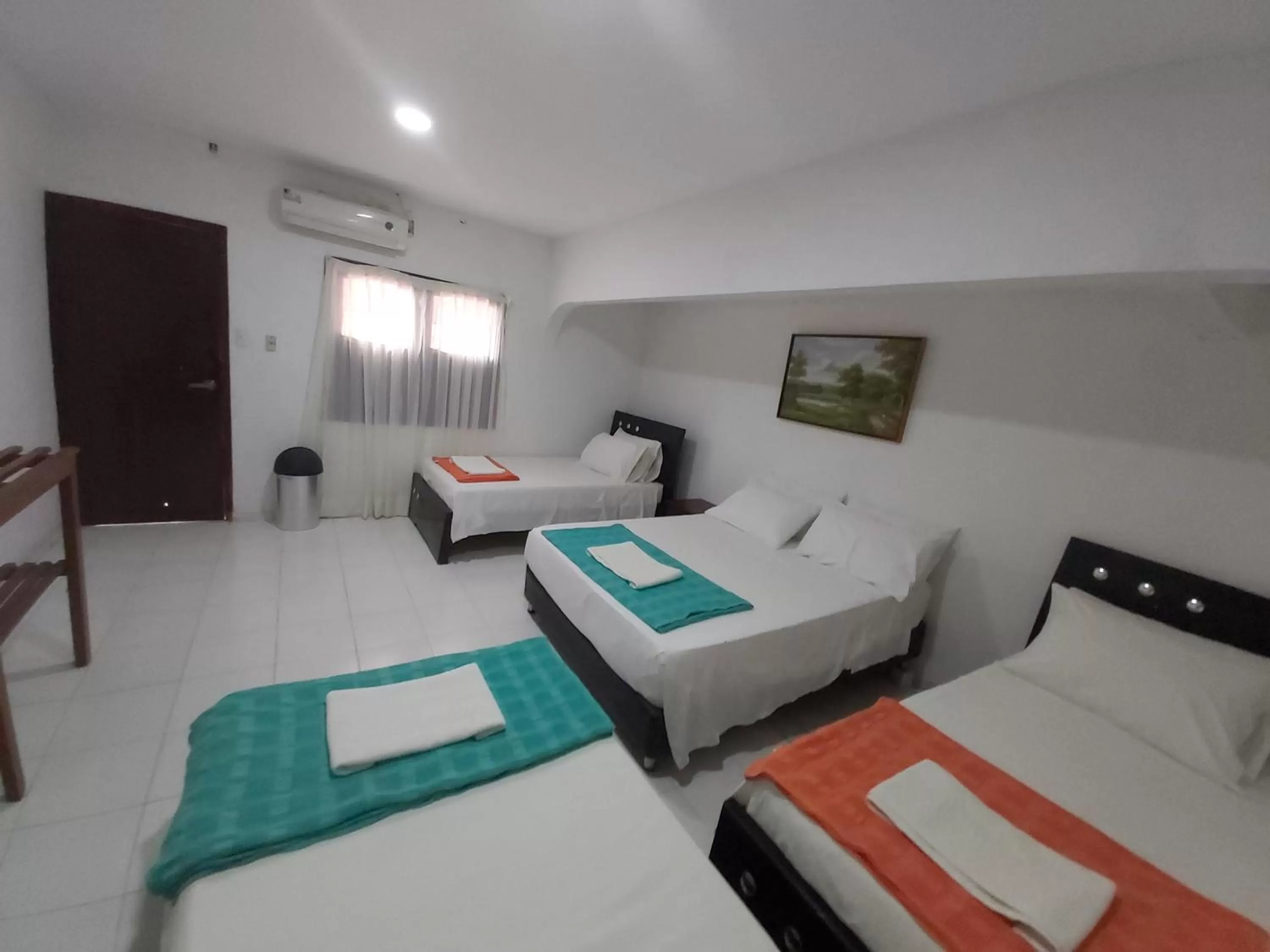 Communal lounge/ TV room, Bed in Eco-Hotel Villa Elina