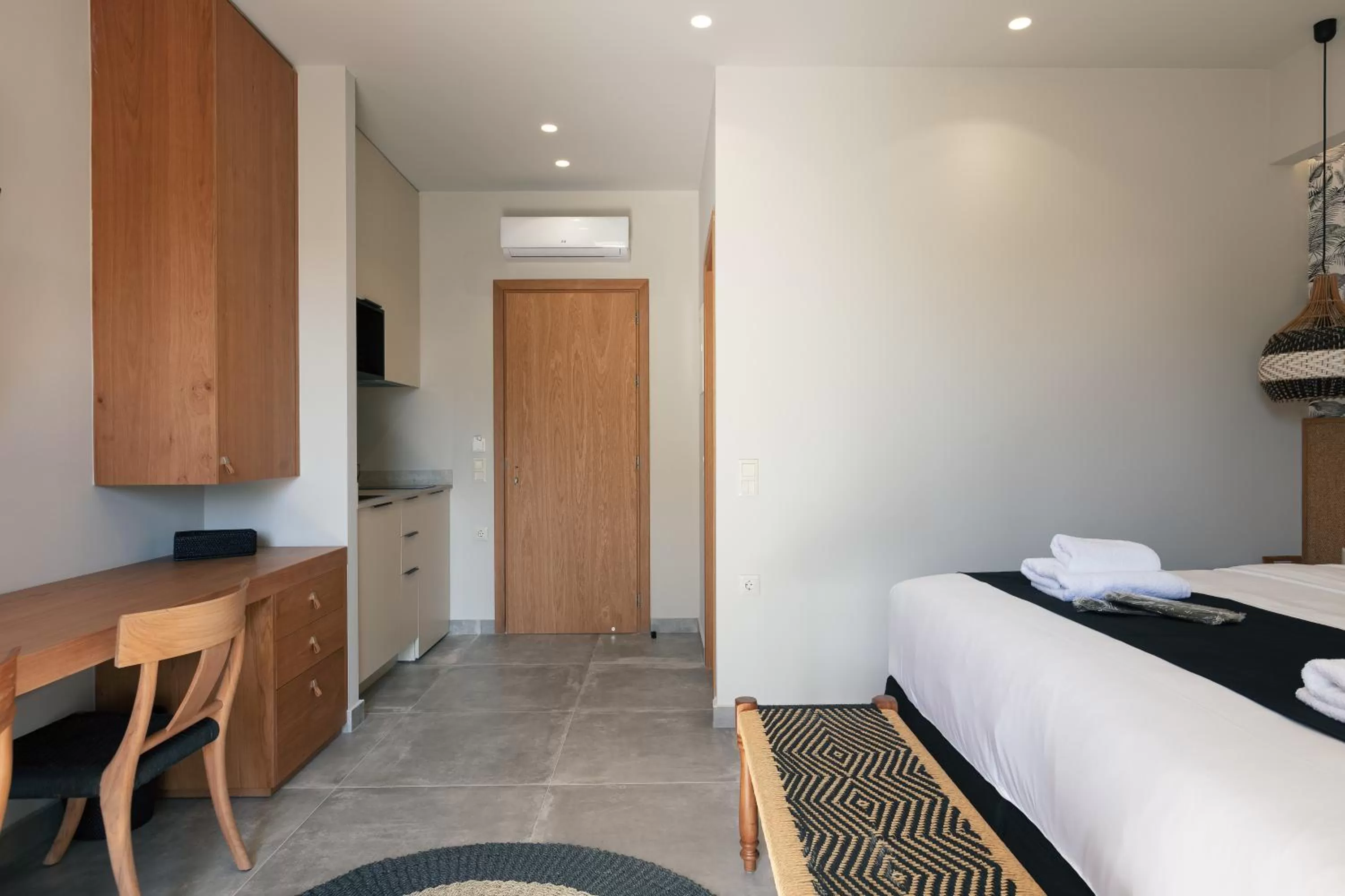 Photo of the whole room, Bed in Chapter 02 Gallery Suites