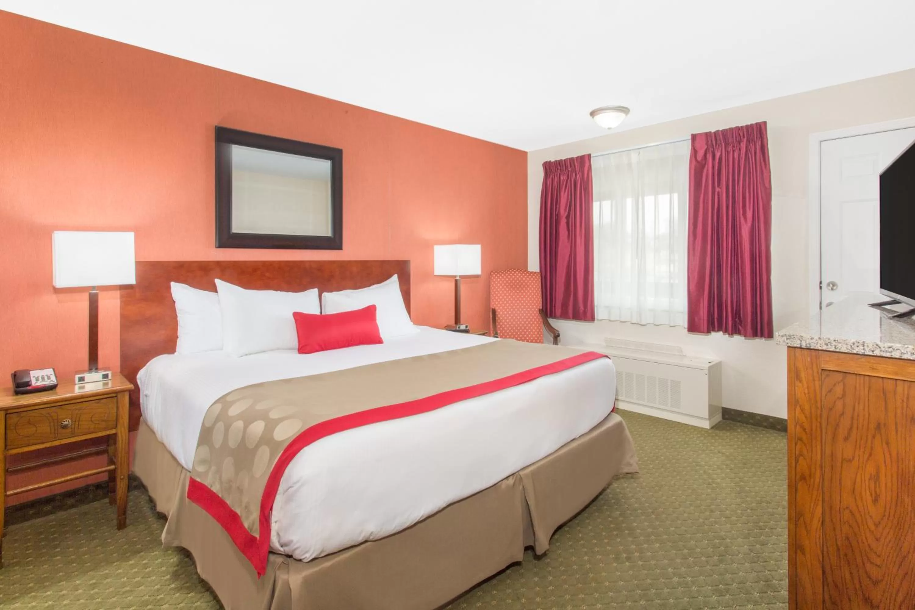Bed in Ramada by Wyndham Elko Hotel at Stockmen's Casino