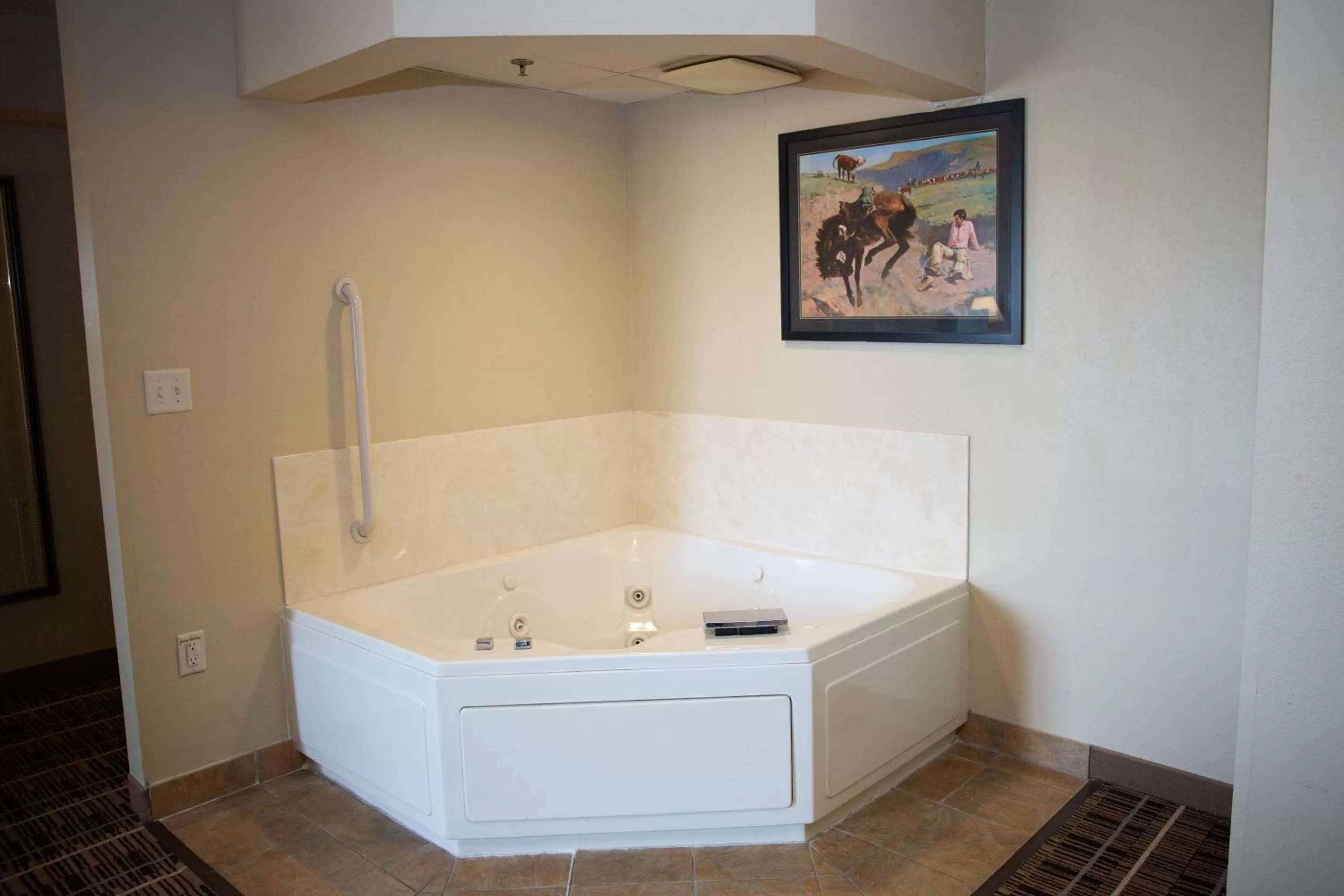 Bathroom in AmericInn by Wyndham Pampa Event Center