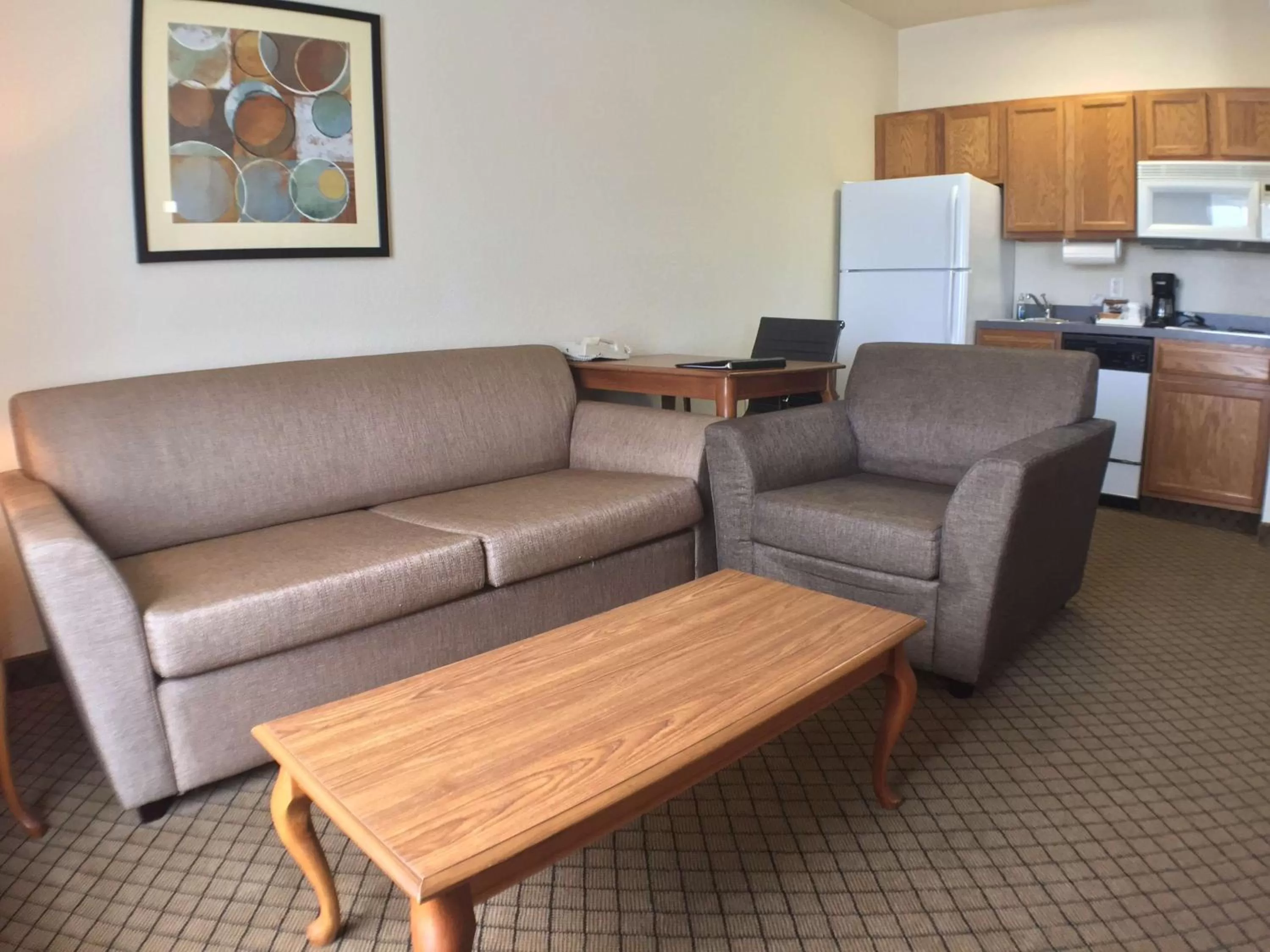 Living room in Hawthorn Extended Stay by Wyndham Decatur