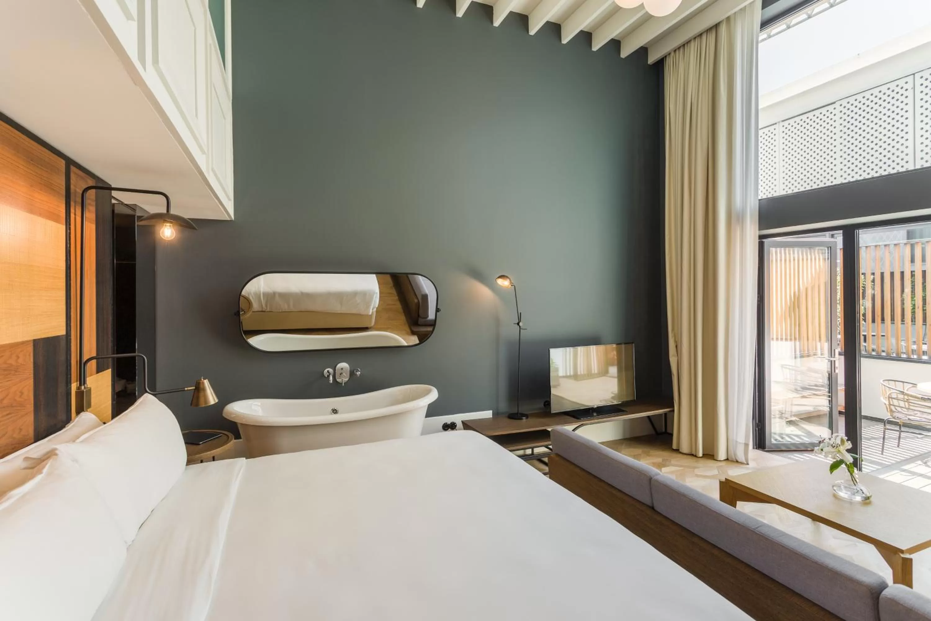 Bed in The Wings Hotels Collection