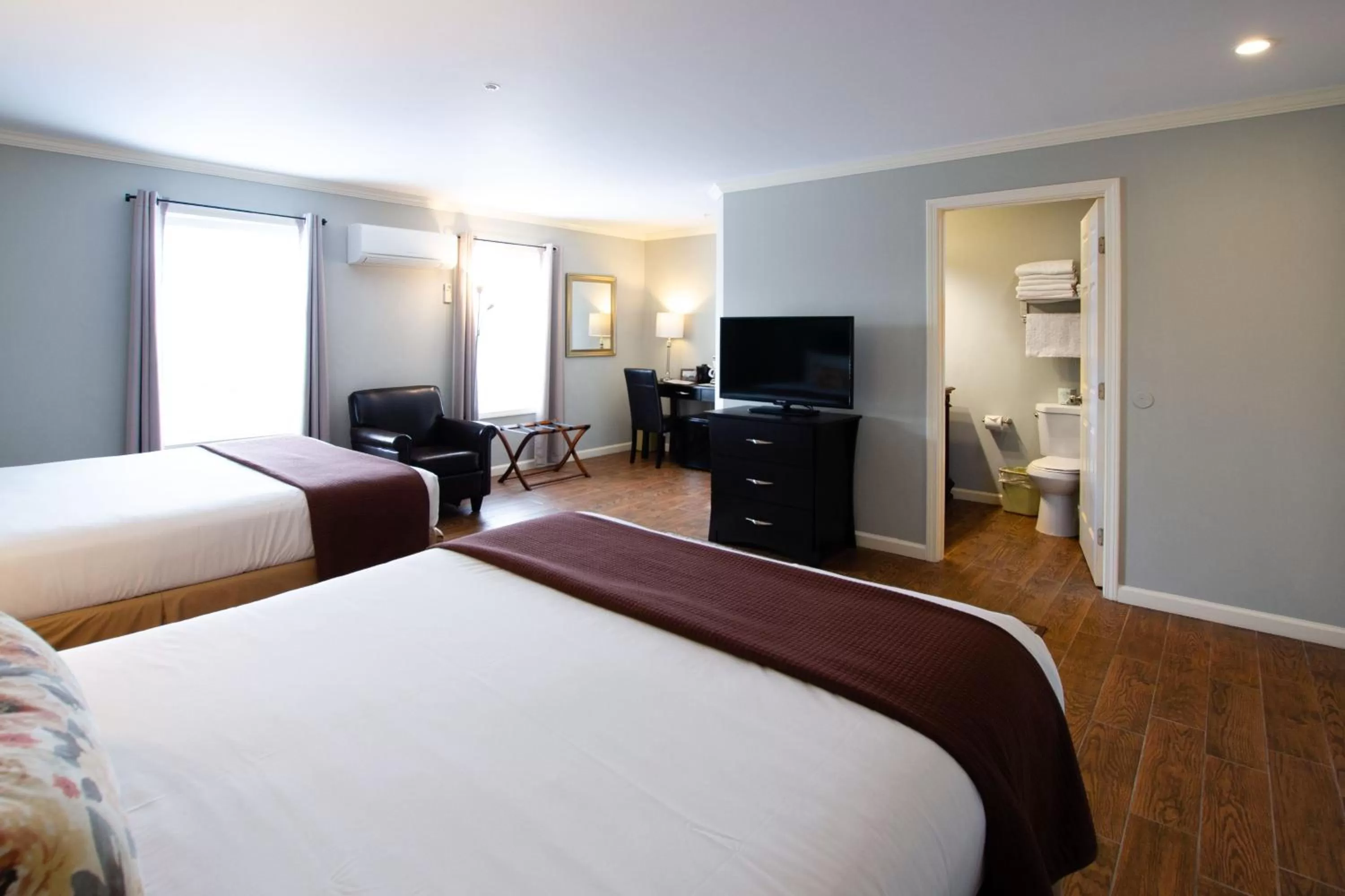 Bed in The Dahlonega Square Hotel