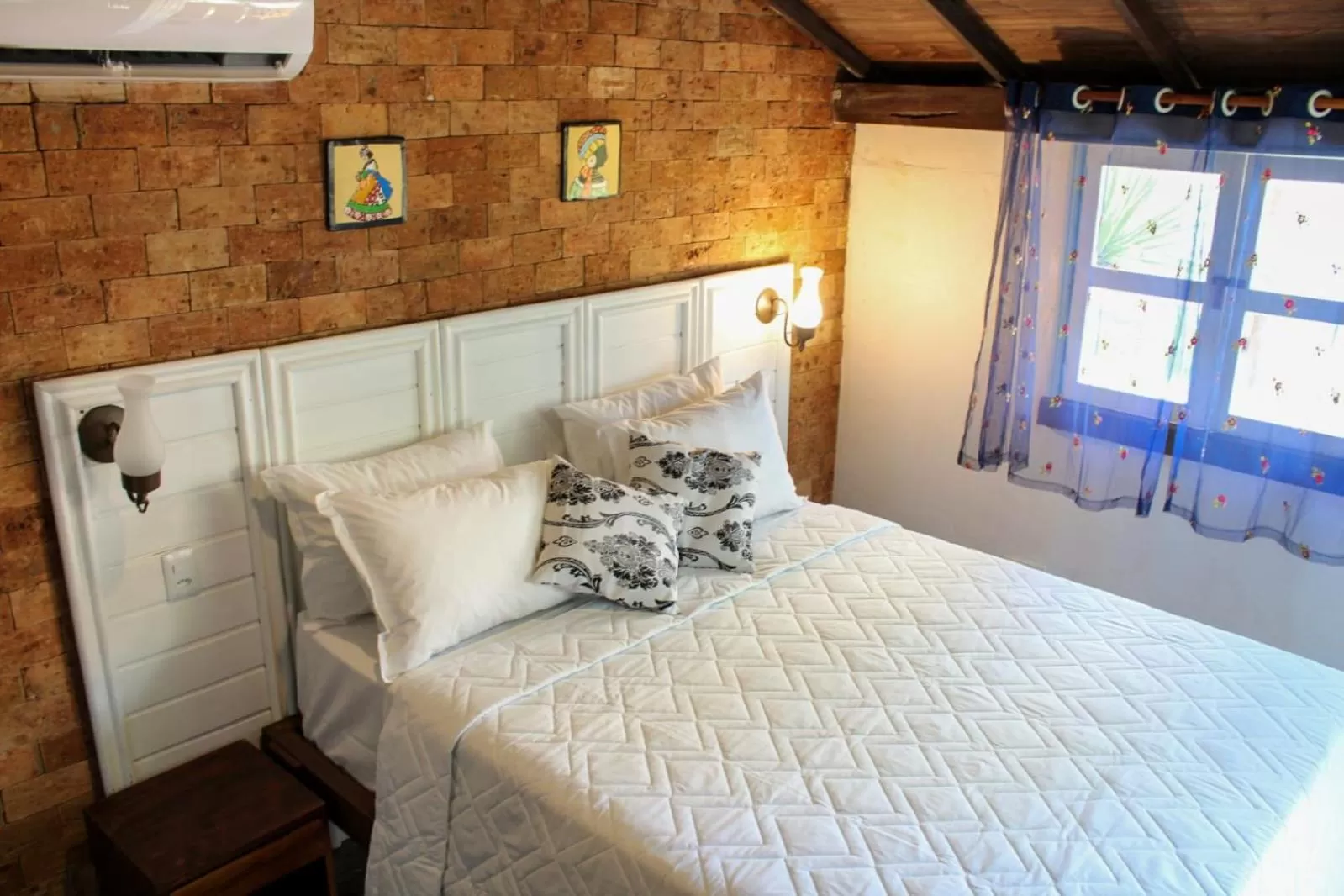 Bed in Pousada dos Hibiscus