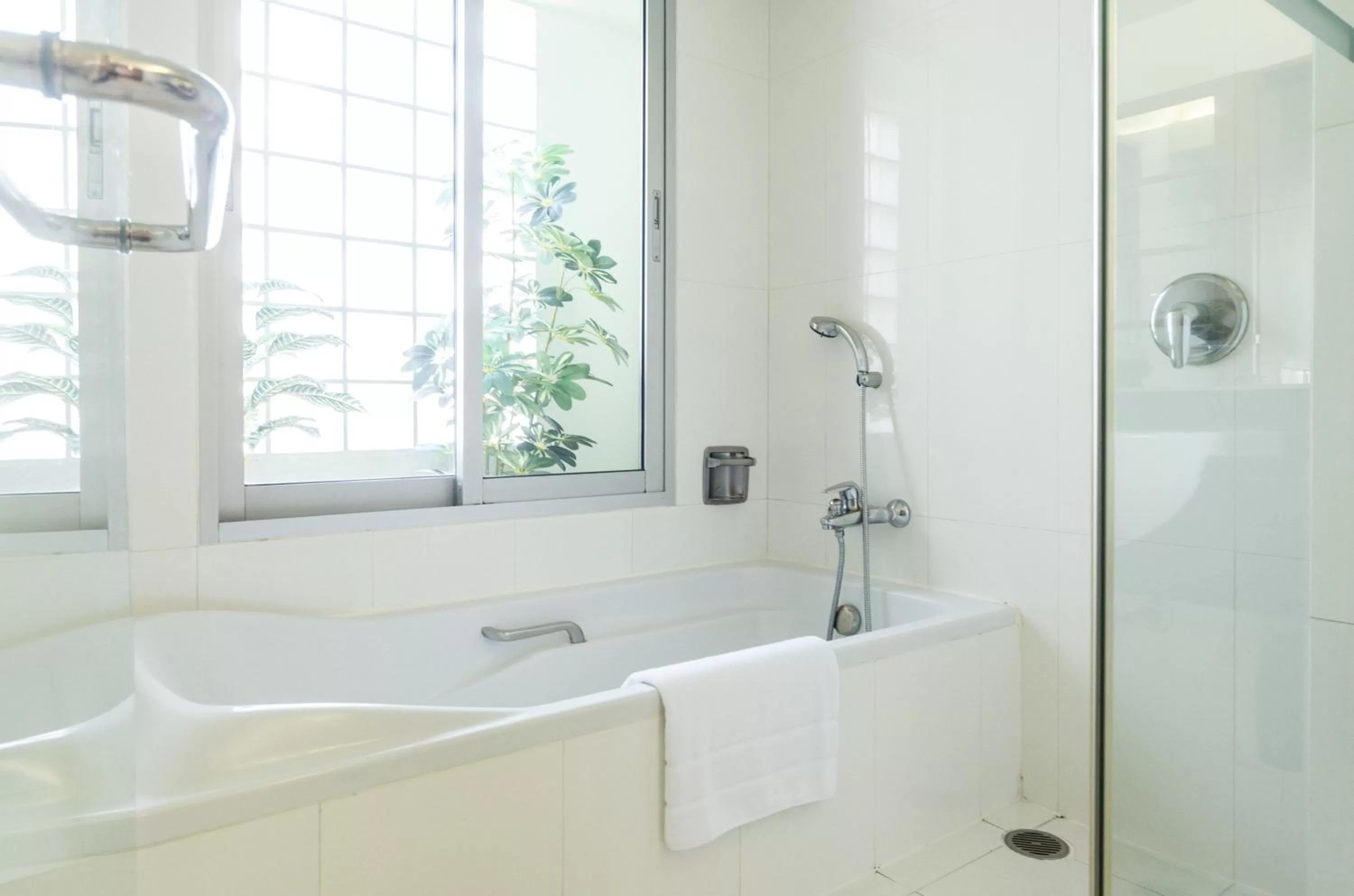 Bathroom in AT EASE saladaeng by AETAS