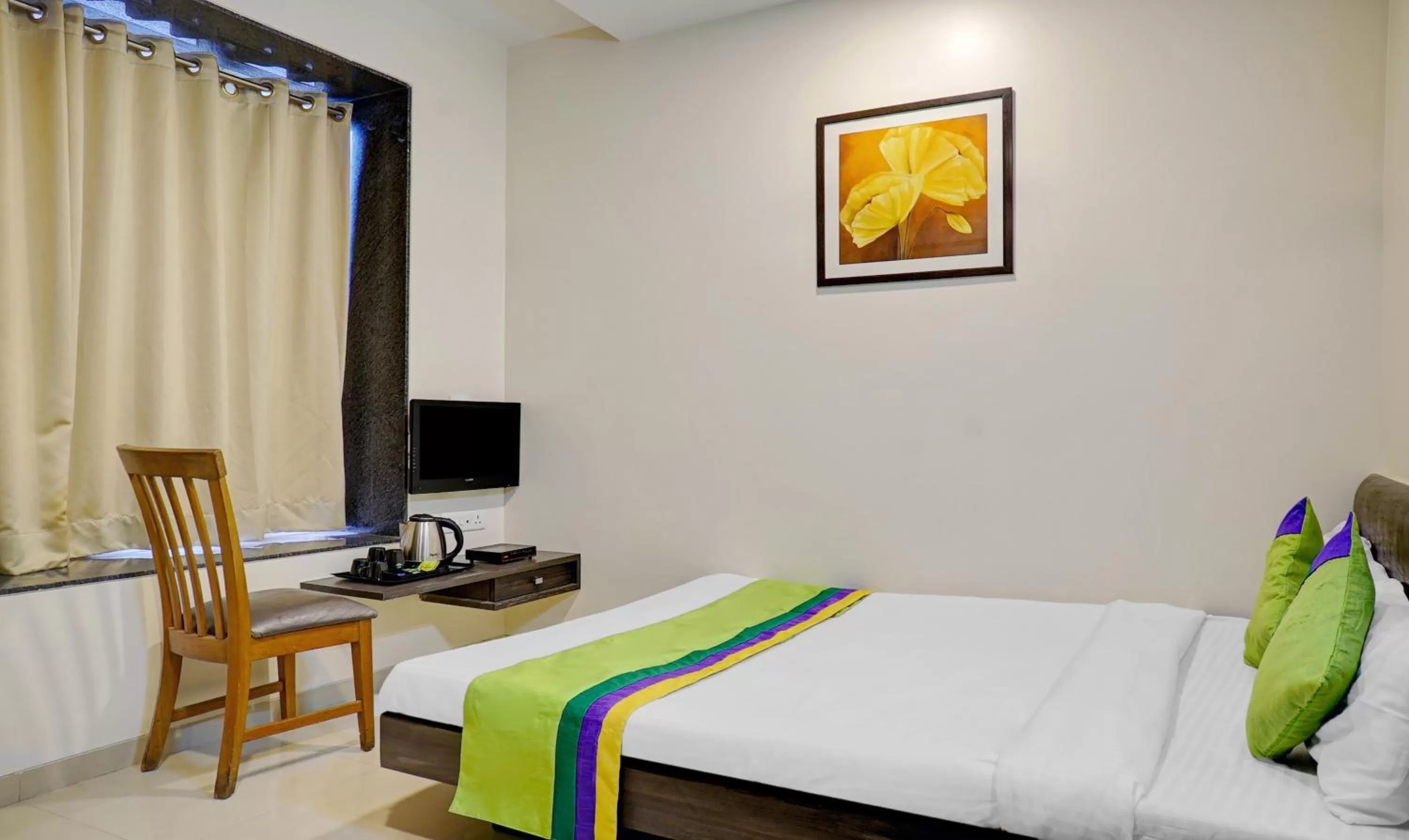 Bedroom, Bed in Treebo Bhagyashree Executive