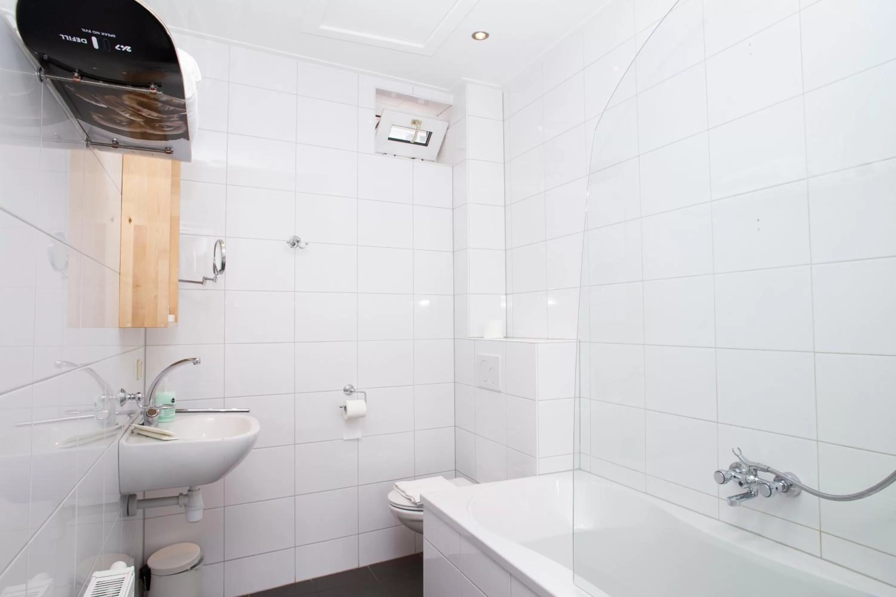 Bathroom in HOLT Hotel