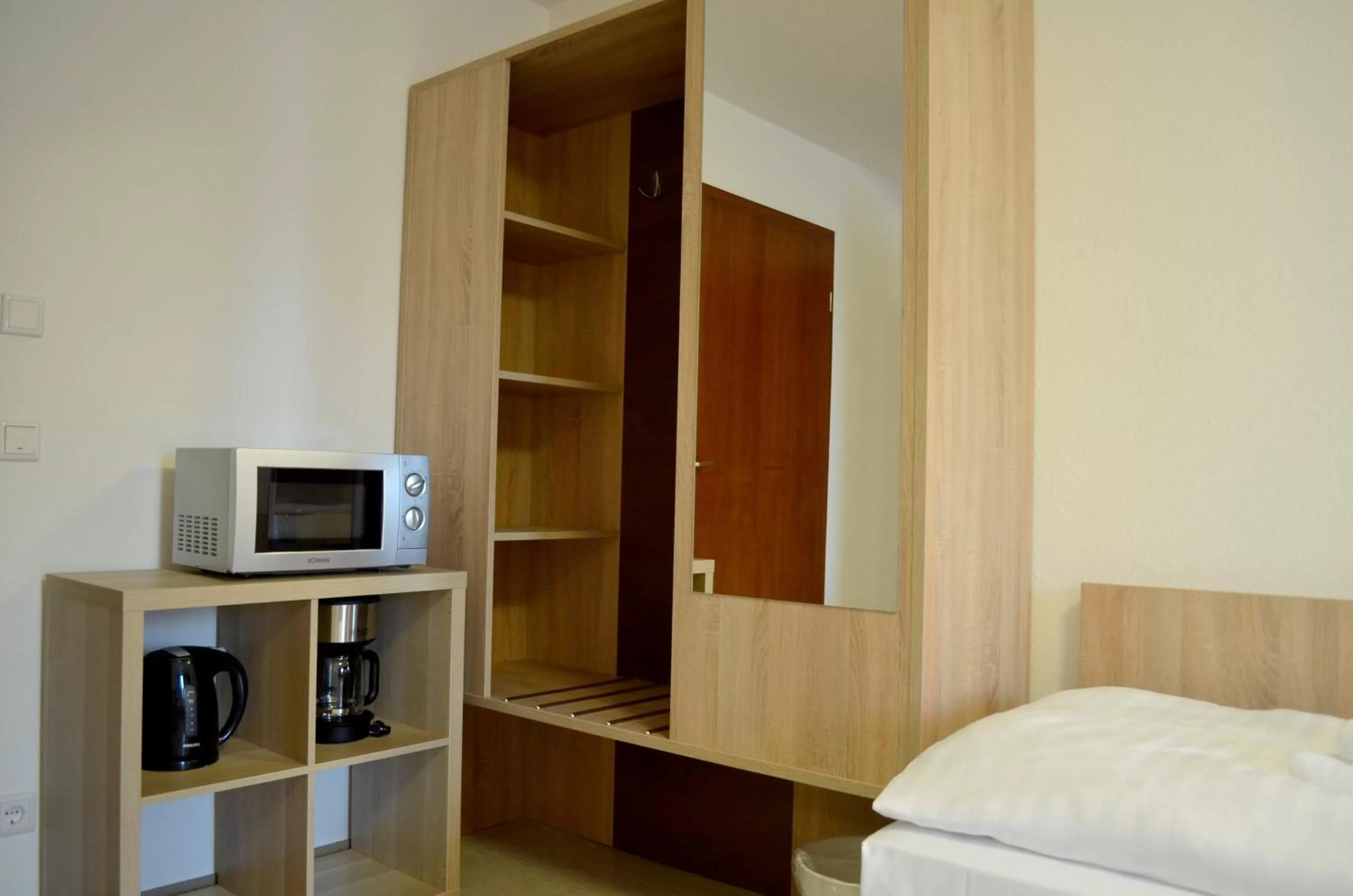 Bed in Hana Aparthotel