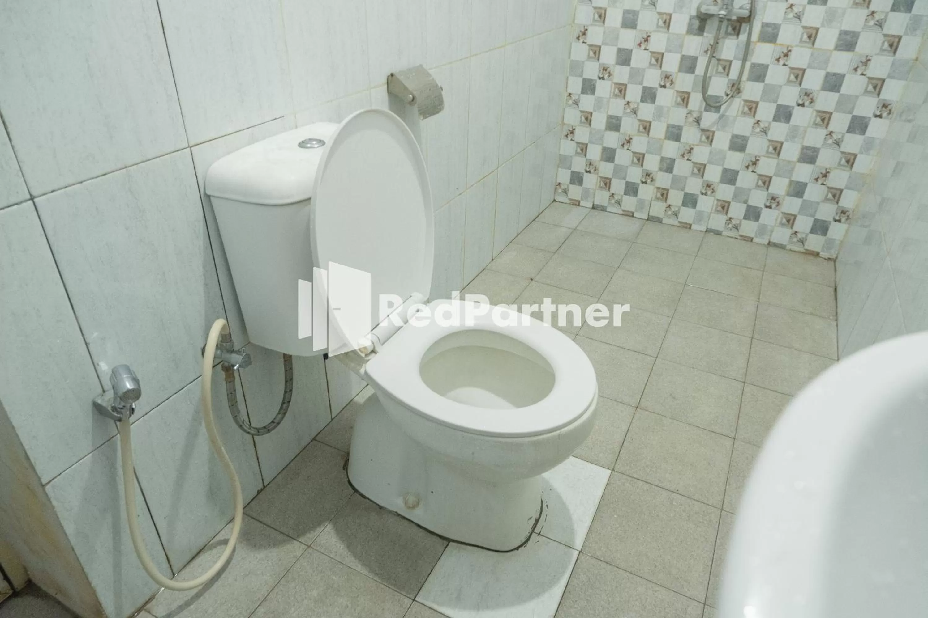 Bathroom in Crown Residence near Tugu Yogyakarta RedPartner