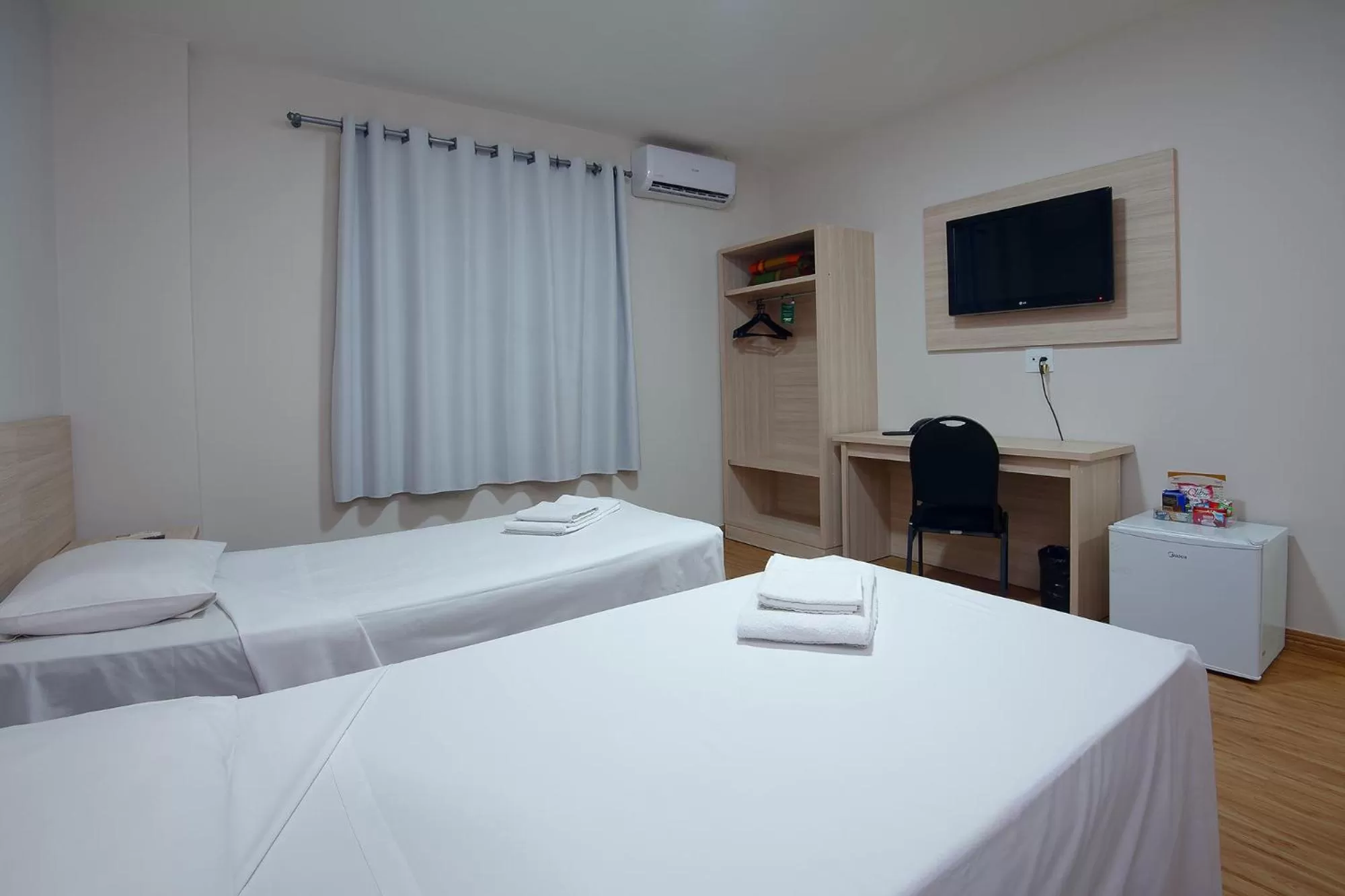 Bed in Fênix Hotel Campinas