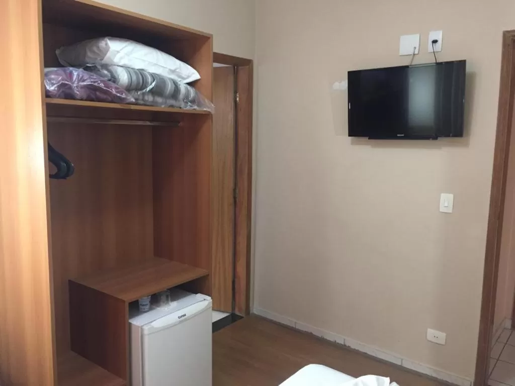 Bedroom, TV/Entertainment Center in Hotel Cisne