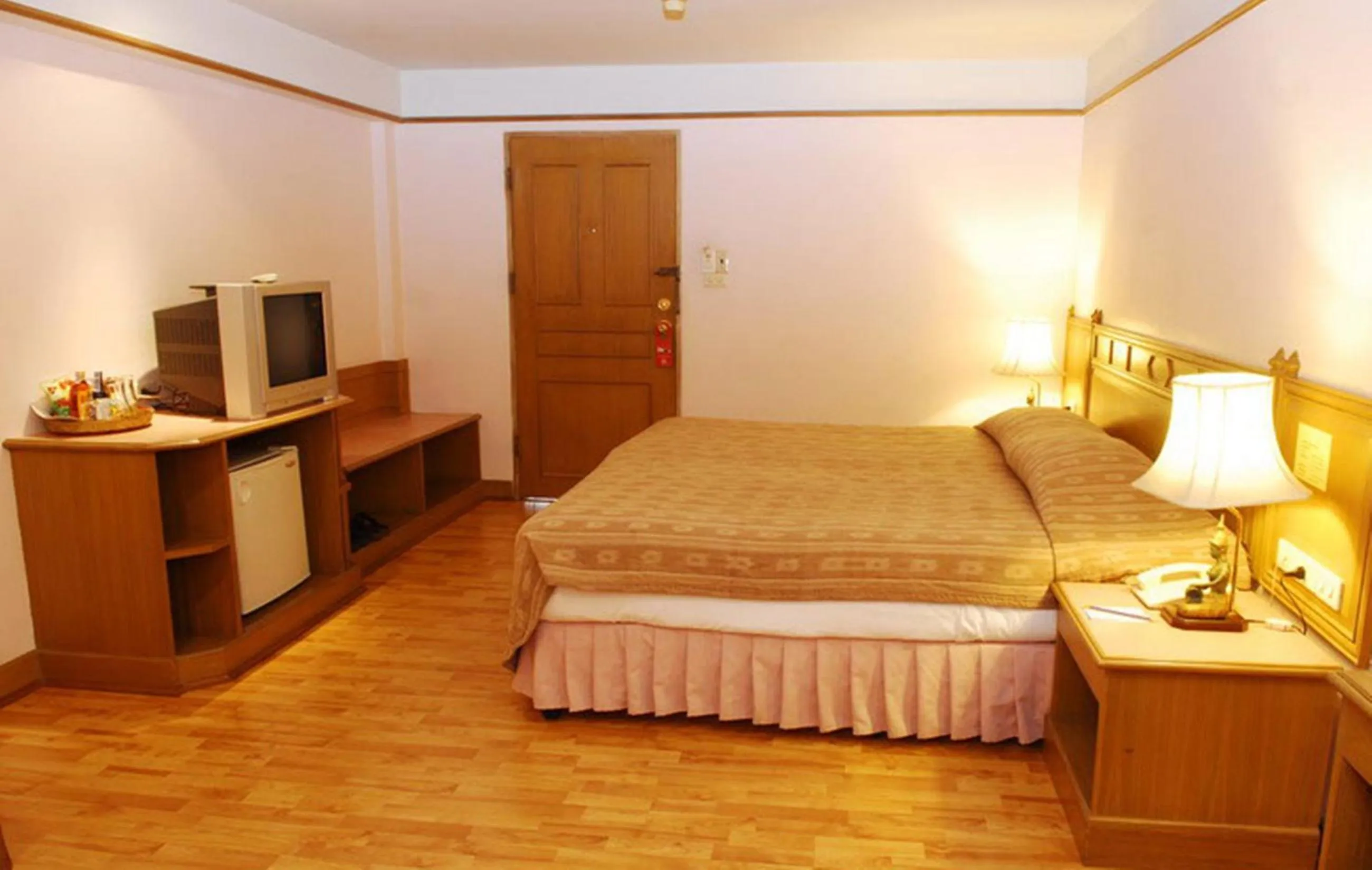 Bed in Silom Village Inn