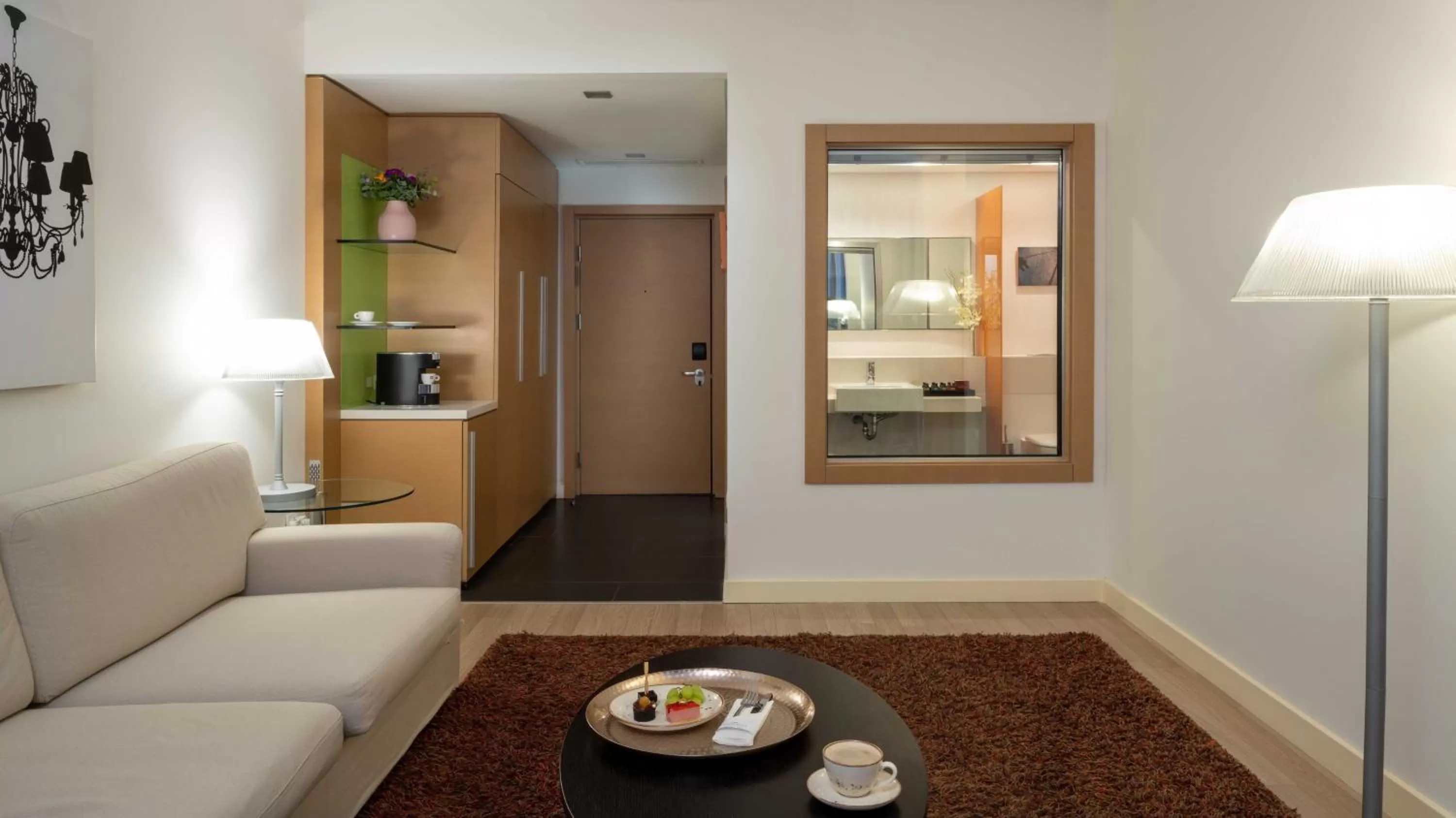 Living room in Crowne Plaza Tel Aviv City Center by IHG