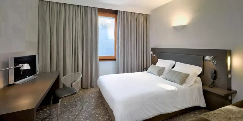 Photo of the whole room, Bed in Hôtel Restaurant Vaillant Colmar Nord