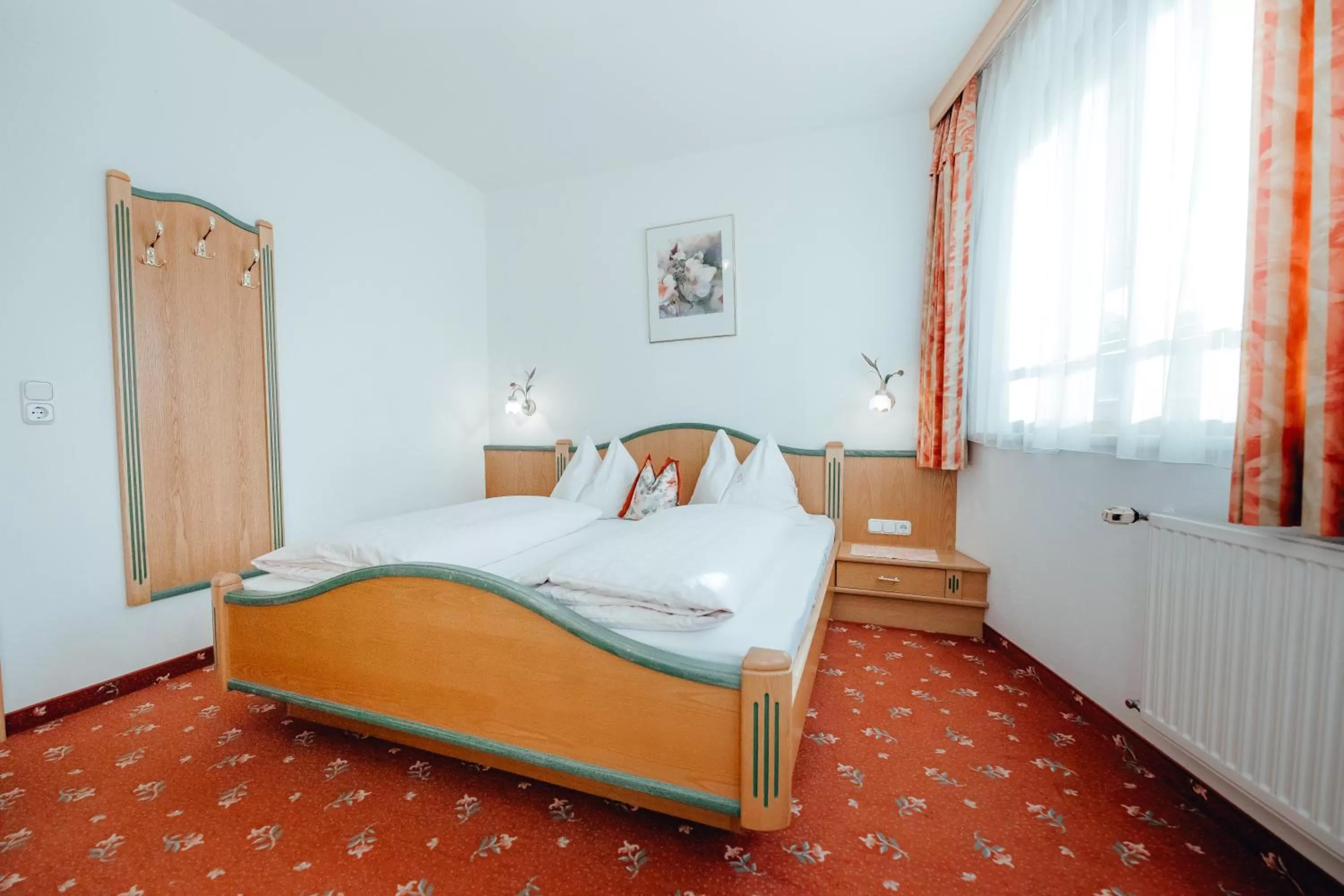 Bed in Dandler - Zimmer und Ferienwohnungen