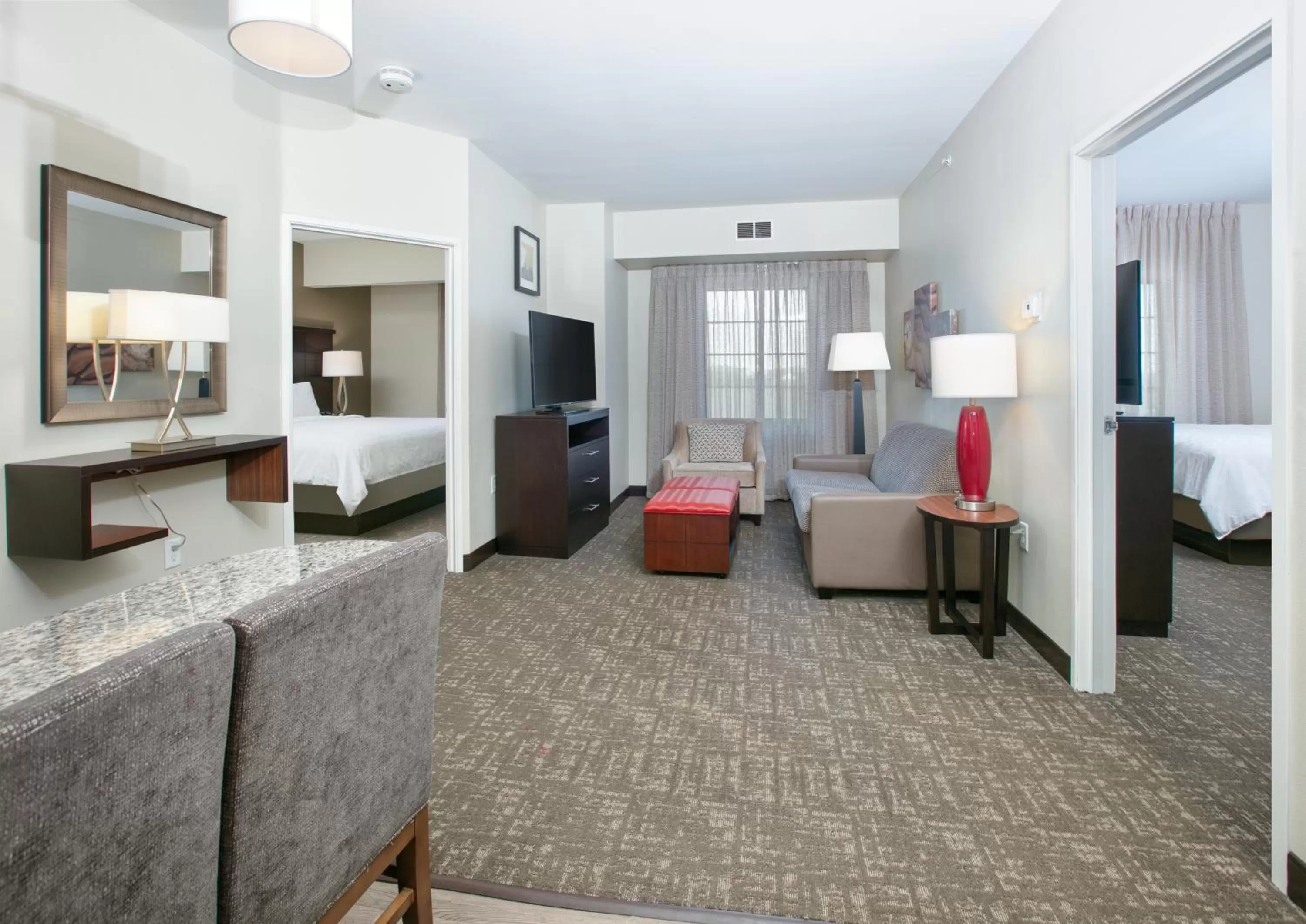 Living room, Bed in Staybridge Suites Plano - Richardson Area by IHG