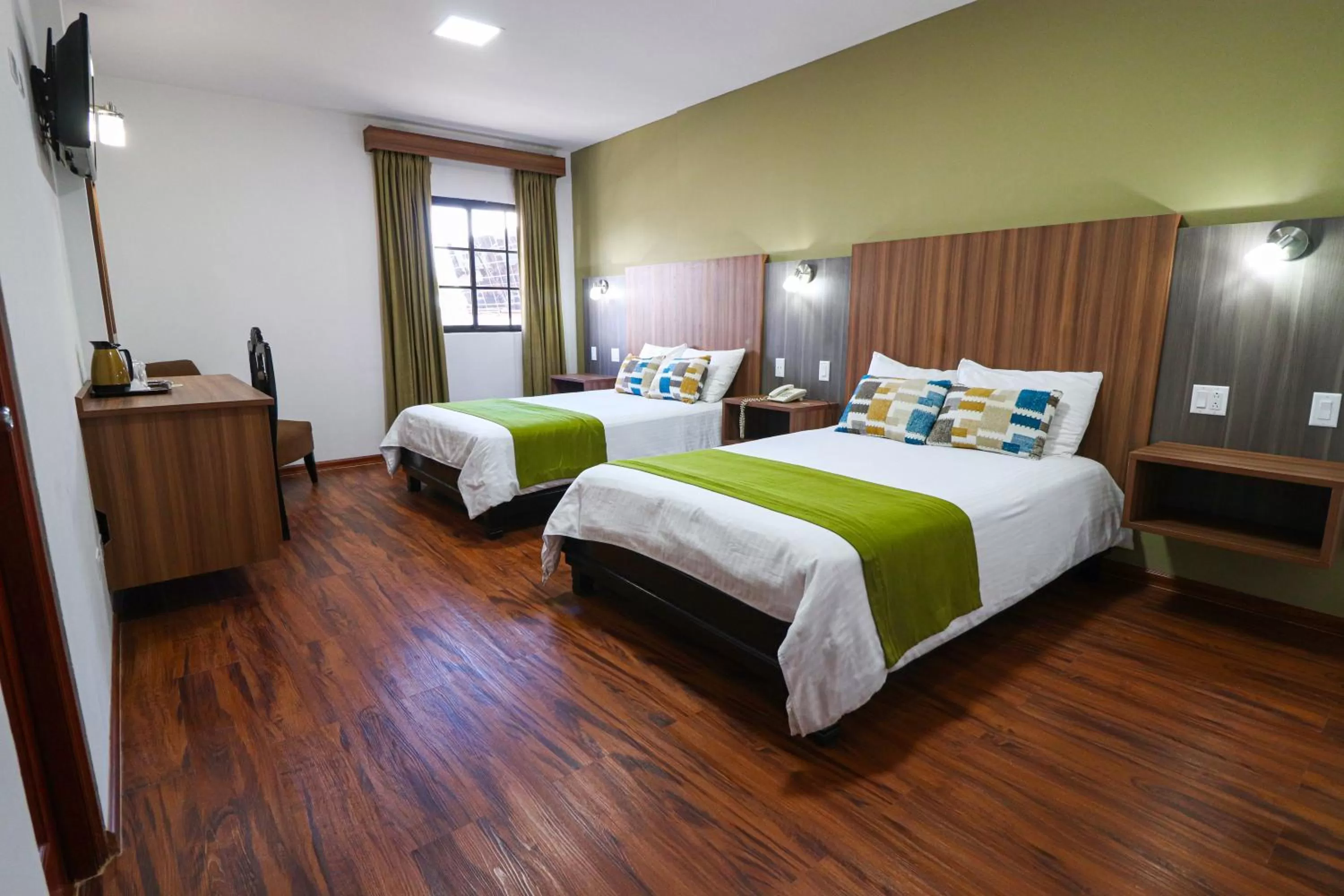 Bed in Hotel Puerta del Sol