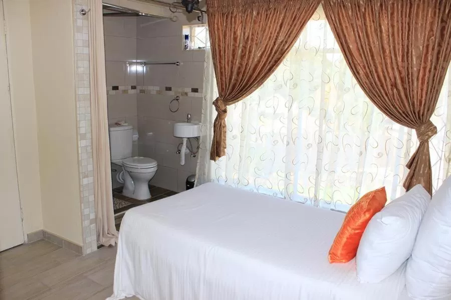 Bed in Moye Guest House