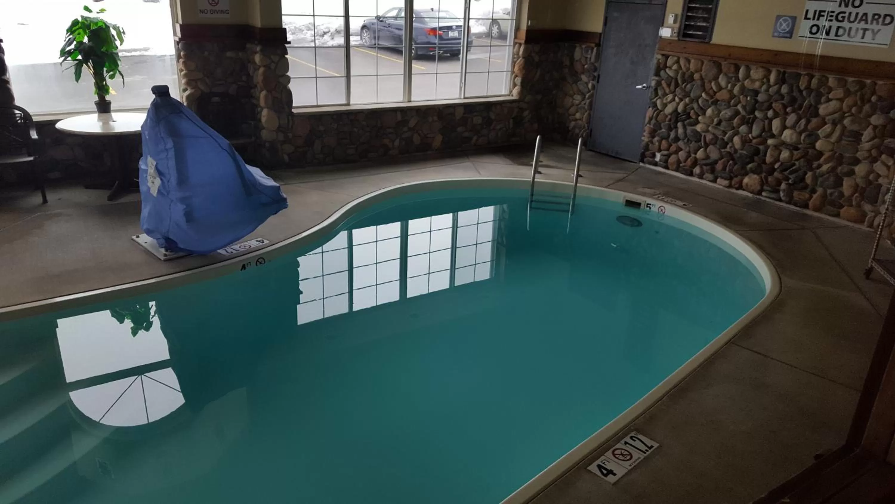 Swimming pool in Microtel Inn & Suites by Wyndham Bozeman