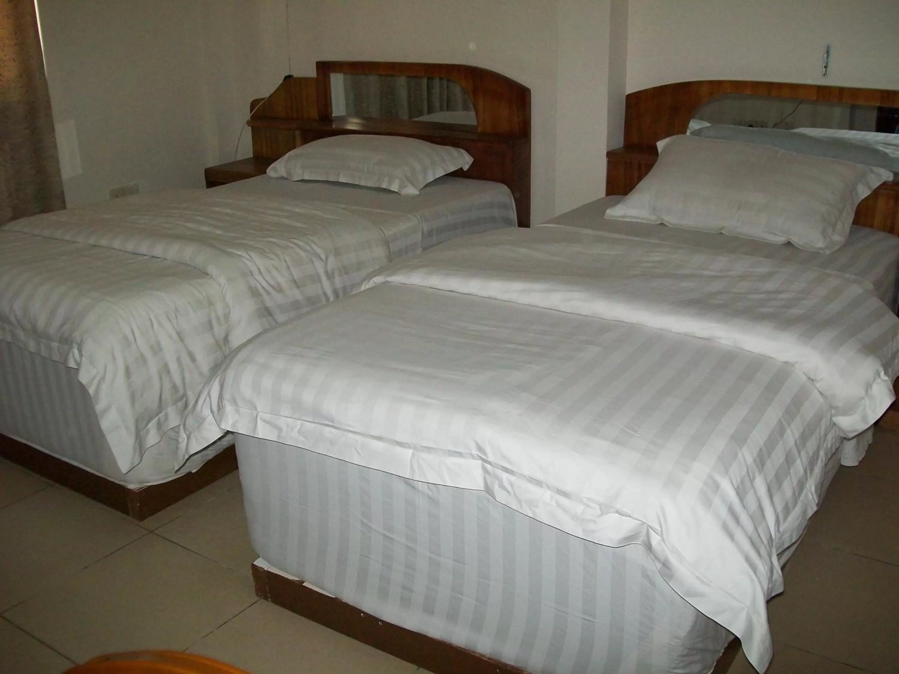 Bed in Ampomaah Hotel