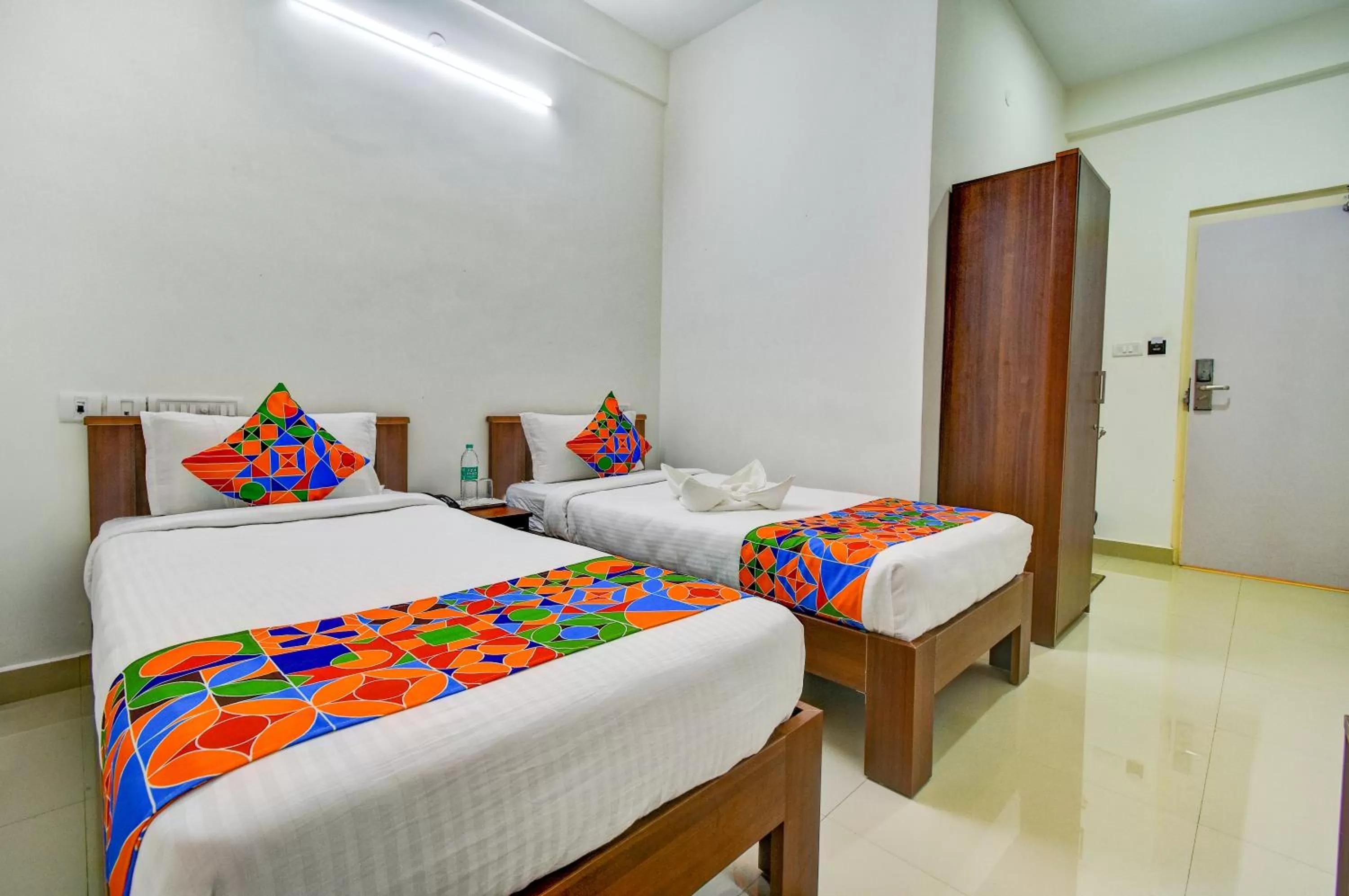 Bed in FabHotel PAS Residency - Nr Marina Beach
