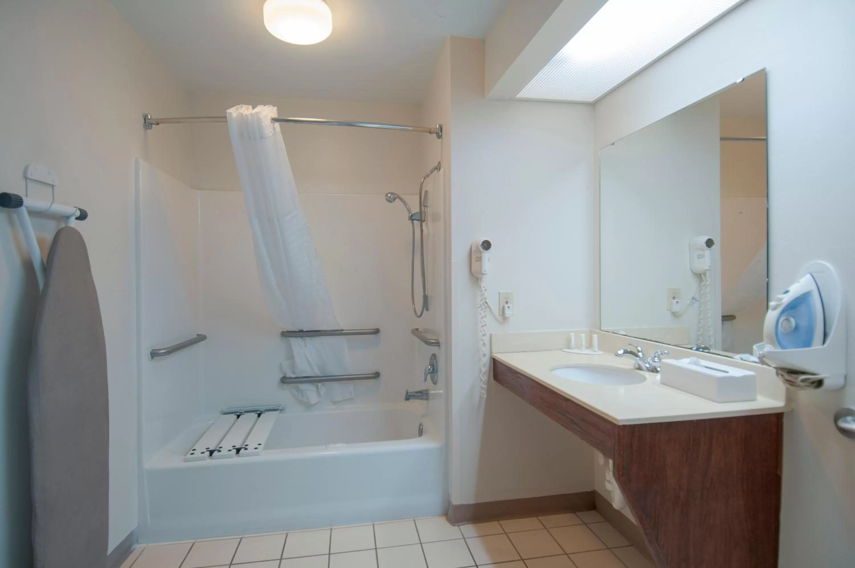 Bathroom in Baymont by Wyndham Tuscaloosa