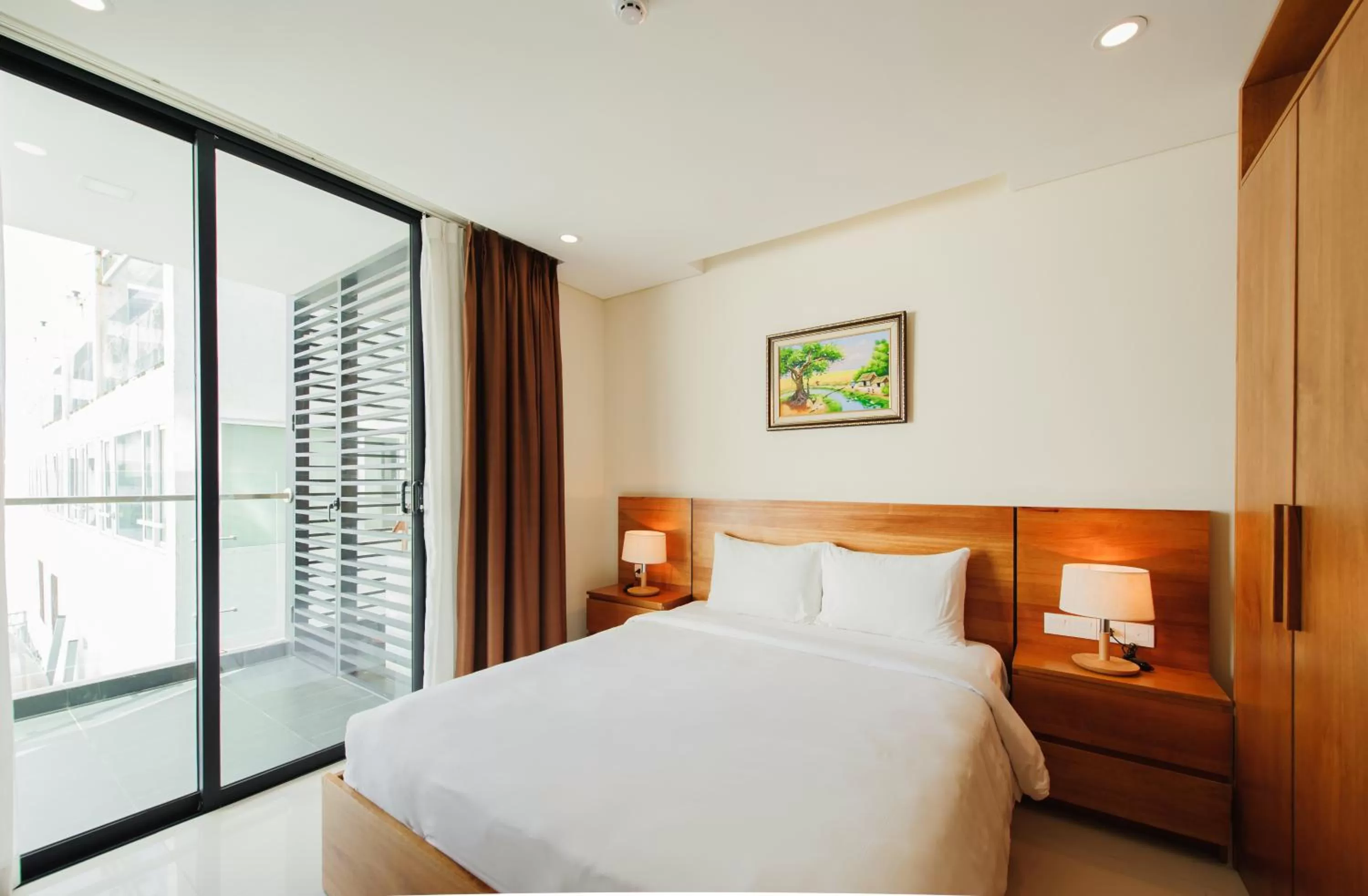 Bed in Maple Hotel & Apartment