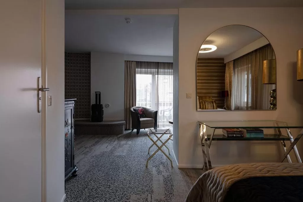 TV/Entertainment Center in Boutique Hotel Slenaker Vallei - Buitengewoongenieten