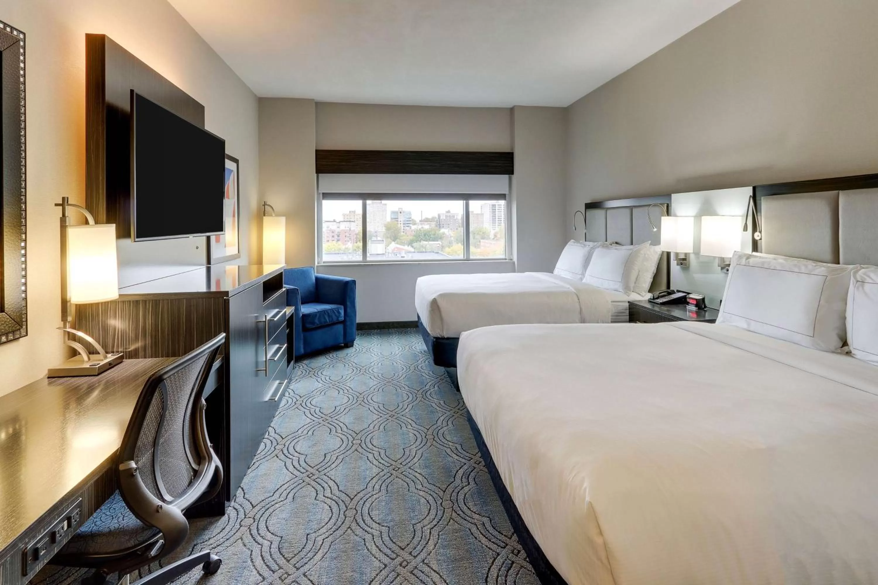 Bed in DoubleTree by Hilton St. Louis Forest Park