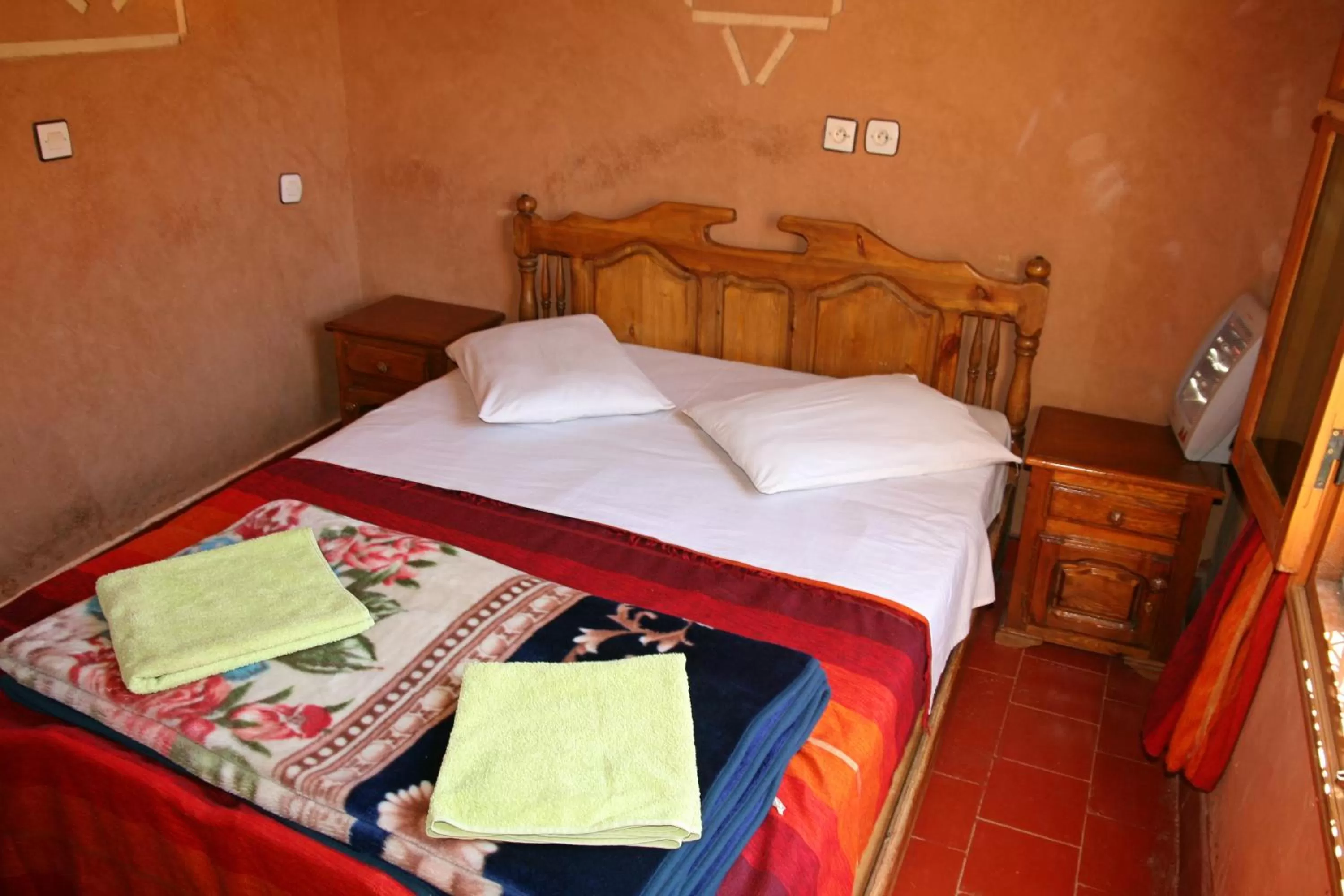 Bed in Maison d'Hôte Valentine