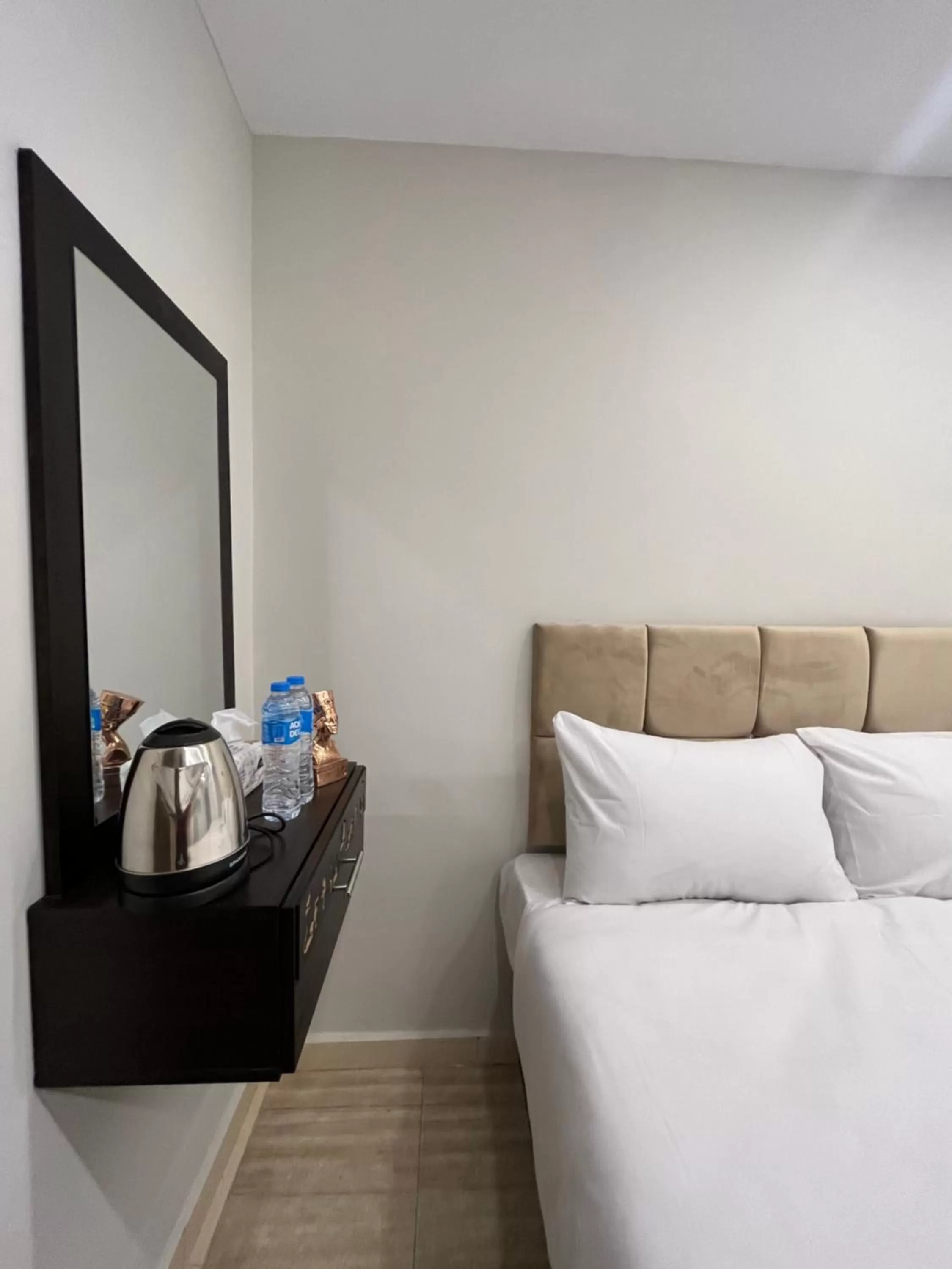 Bed in Crowne Pyramids view inn