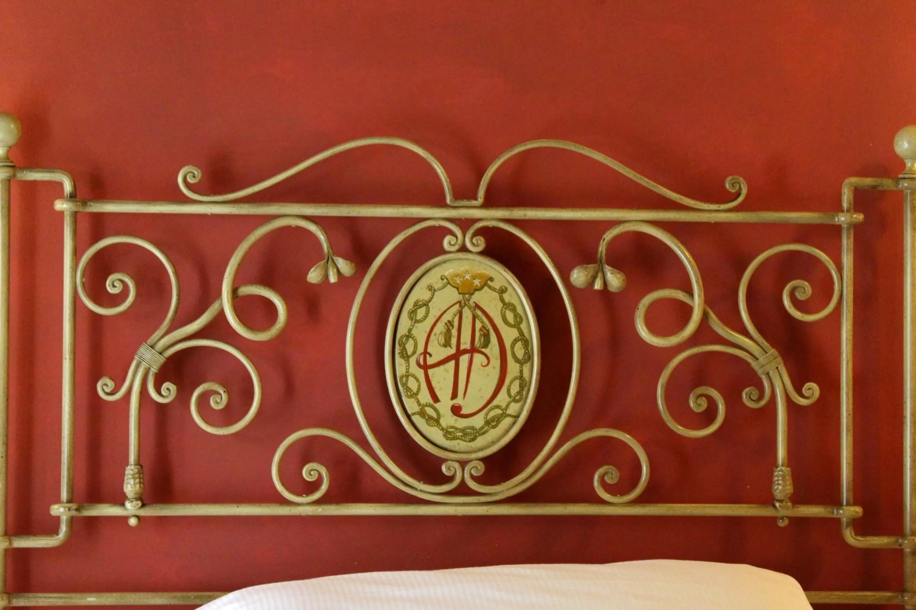 Decorative detail, Bed in Albergo delle Drapperie