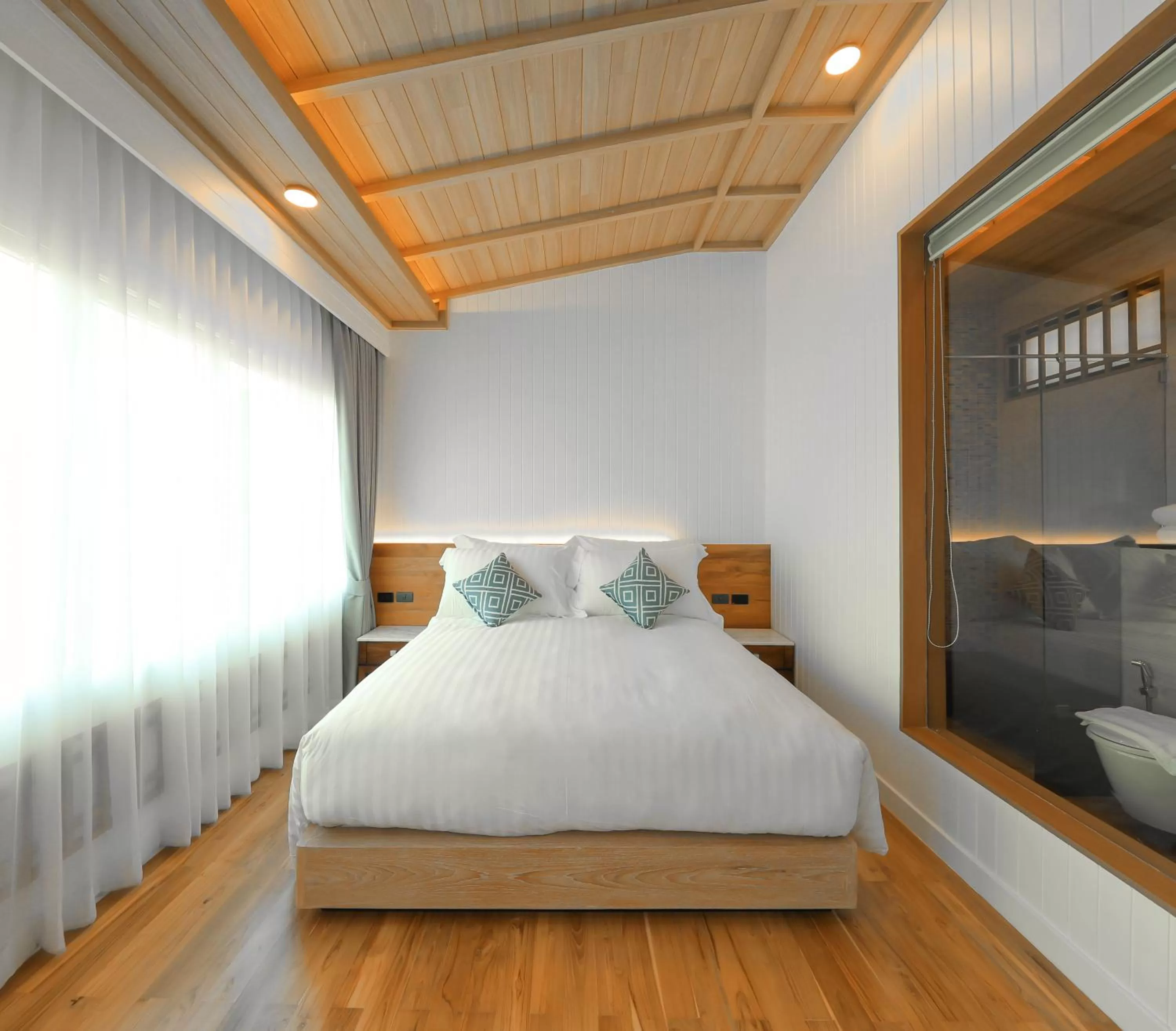 Bed in Kundala Beach Resort Hua Hin