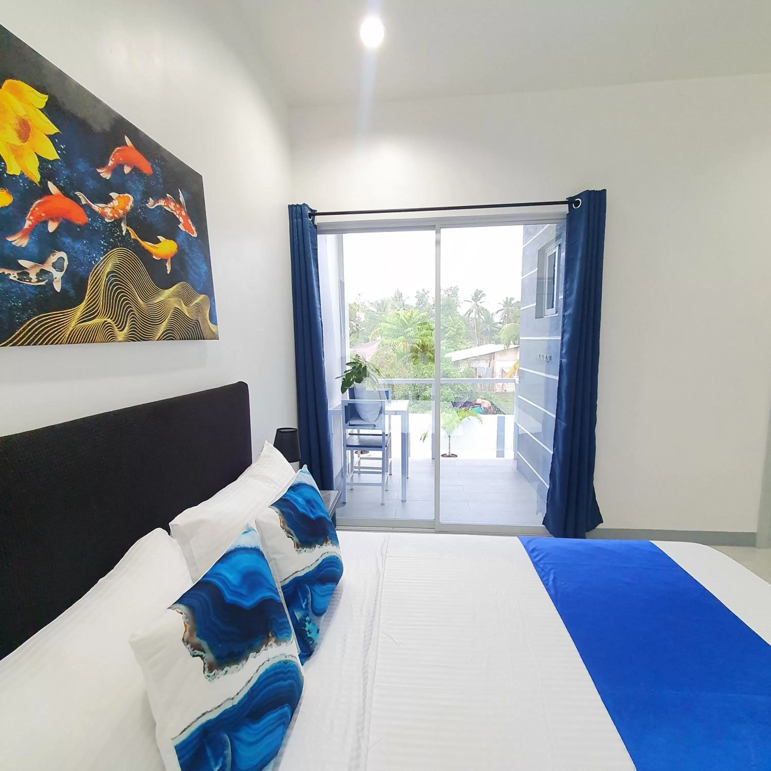 Bed in Sapphire Boutique Resort