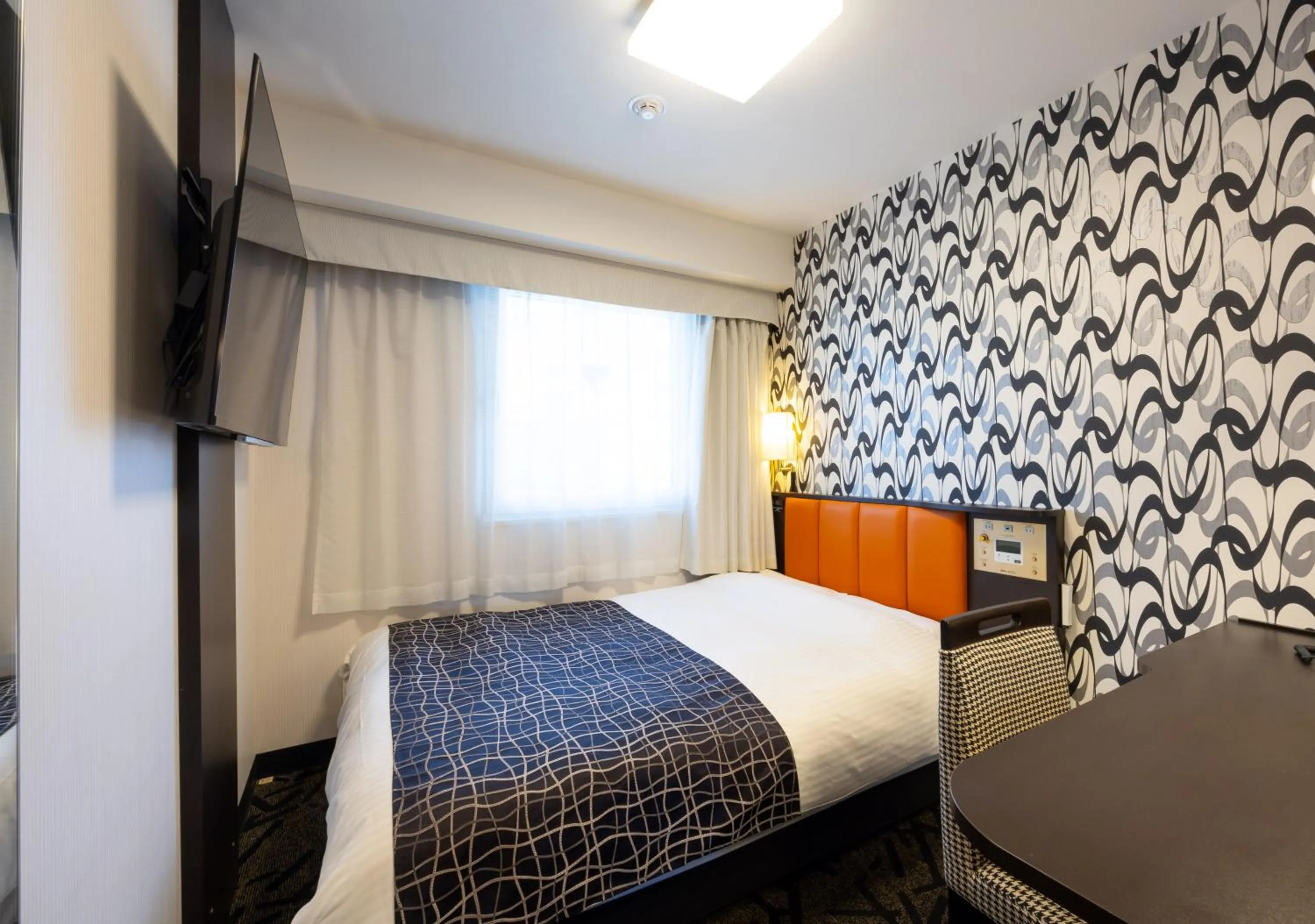 Bed in APA Hotel Osaka Umeda