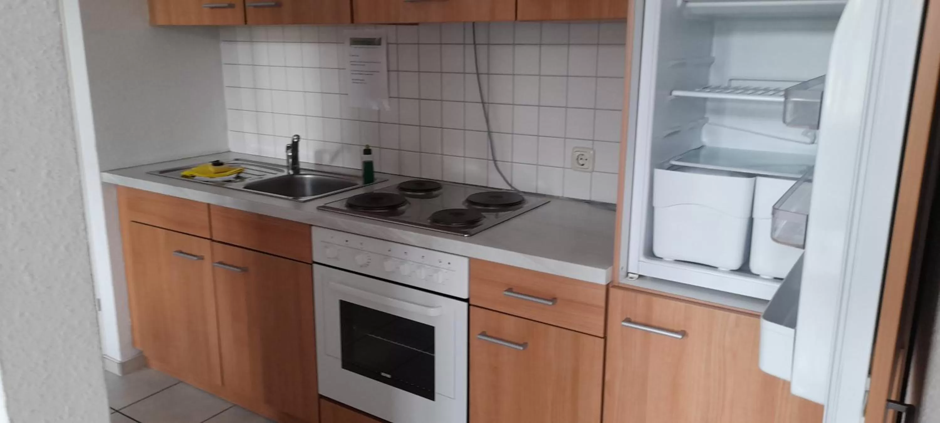 Kitchen/Kitchenette in Apartment-Hotel Schillerplatz
